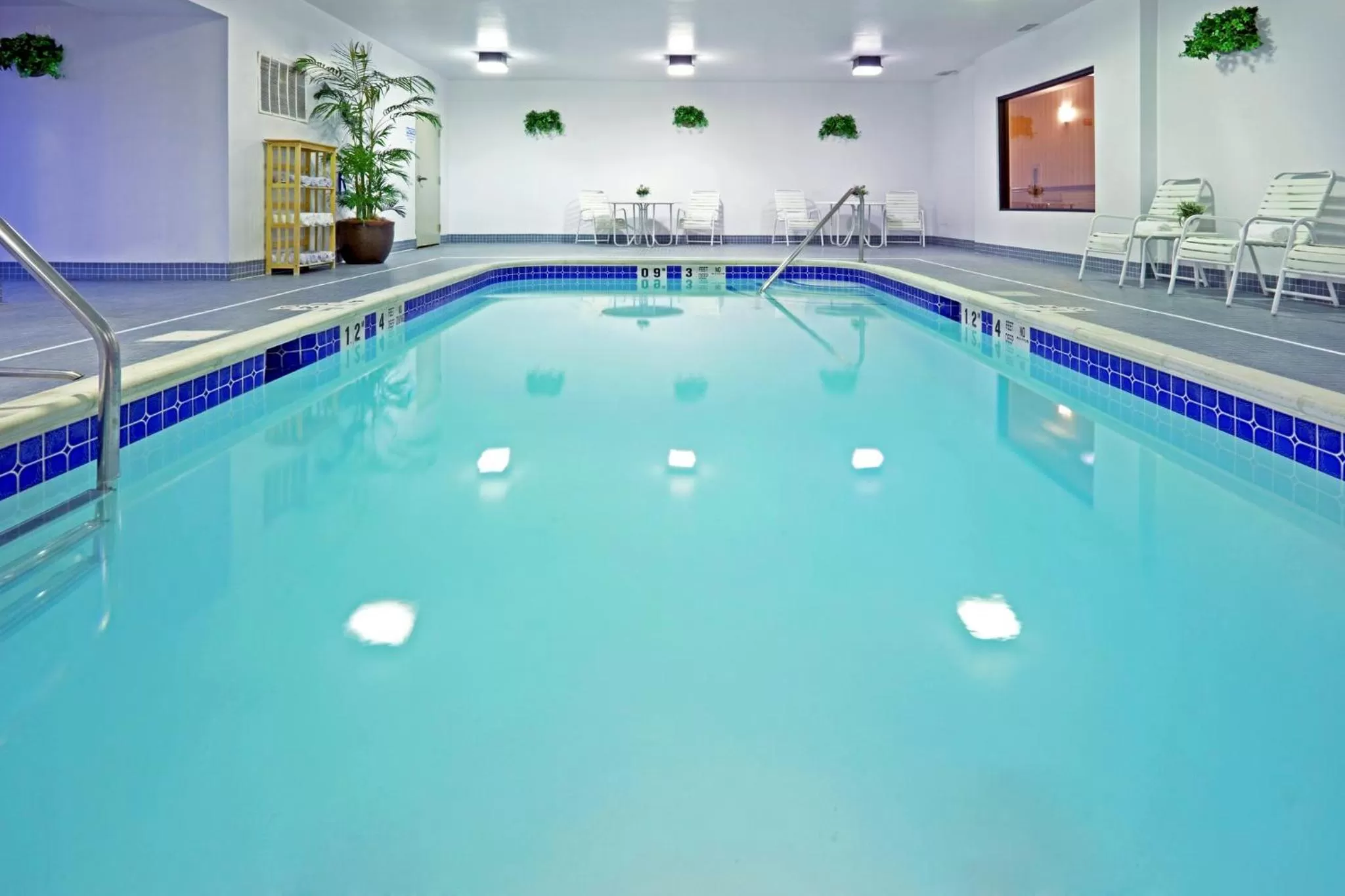 Swimming pool in Holiday Inn Express & Suites East Greenbush Albany-Skyline by IHG
