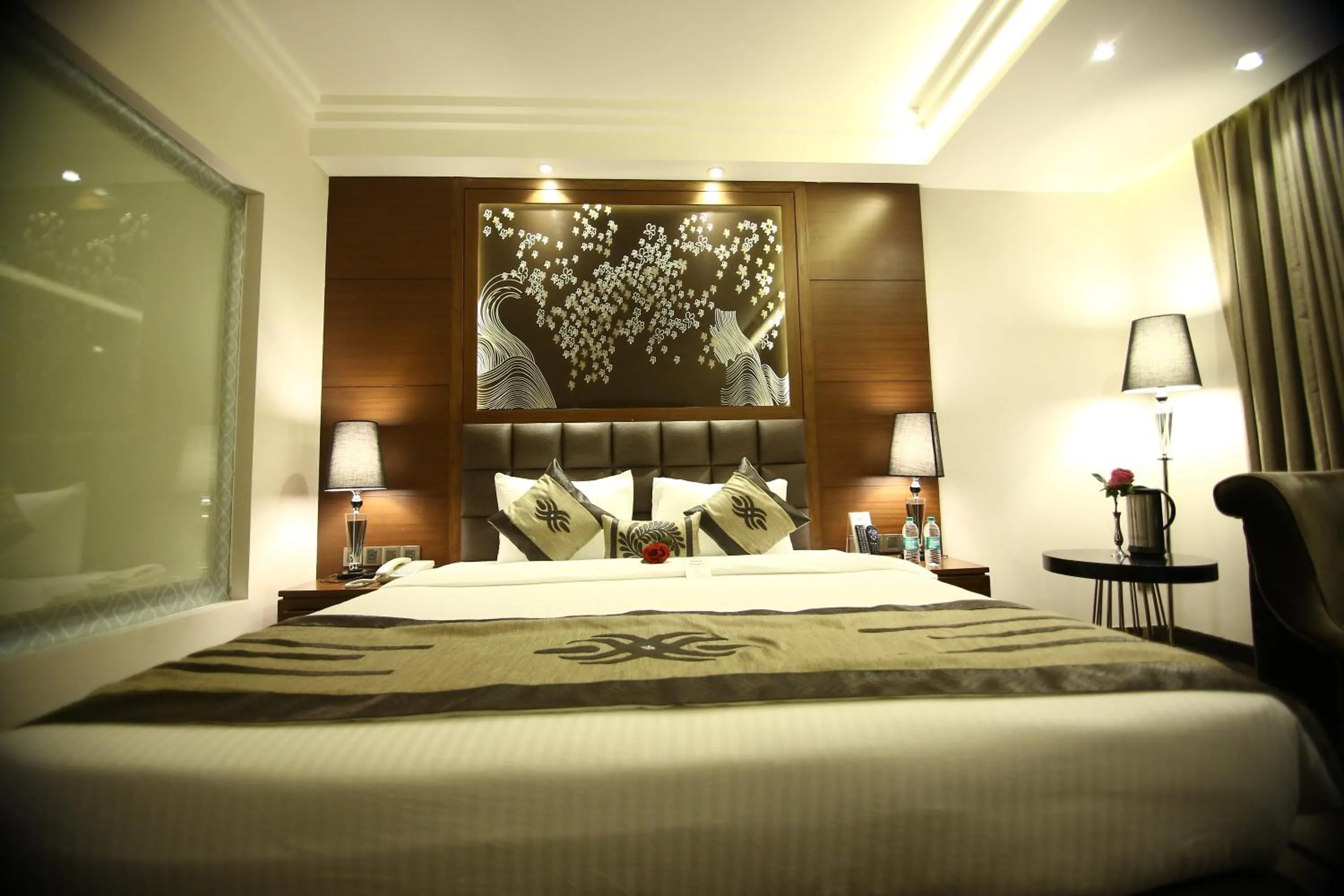 Bed in Hotel JRD Exotica-Business Hotel