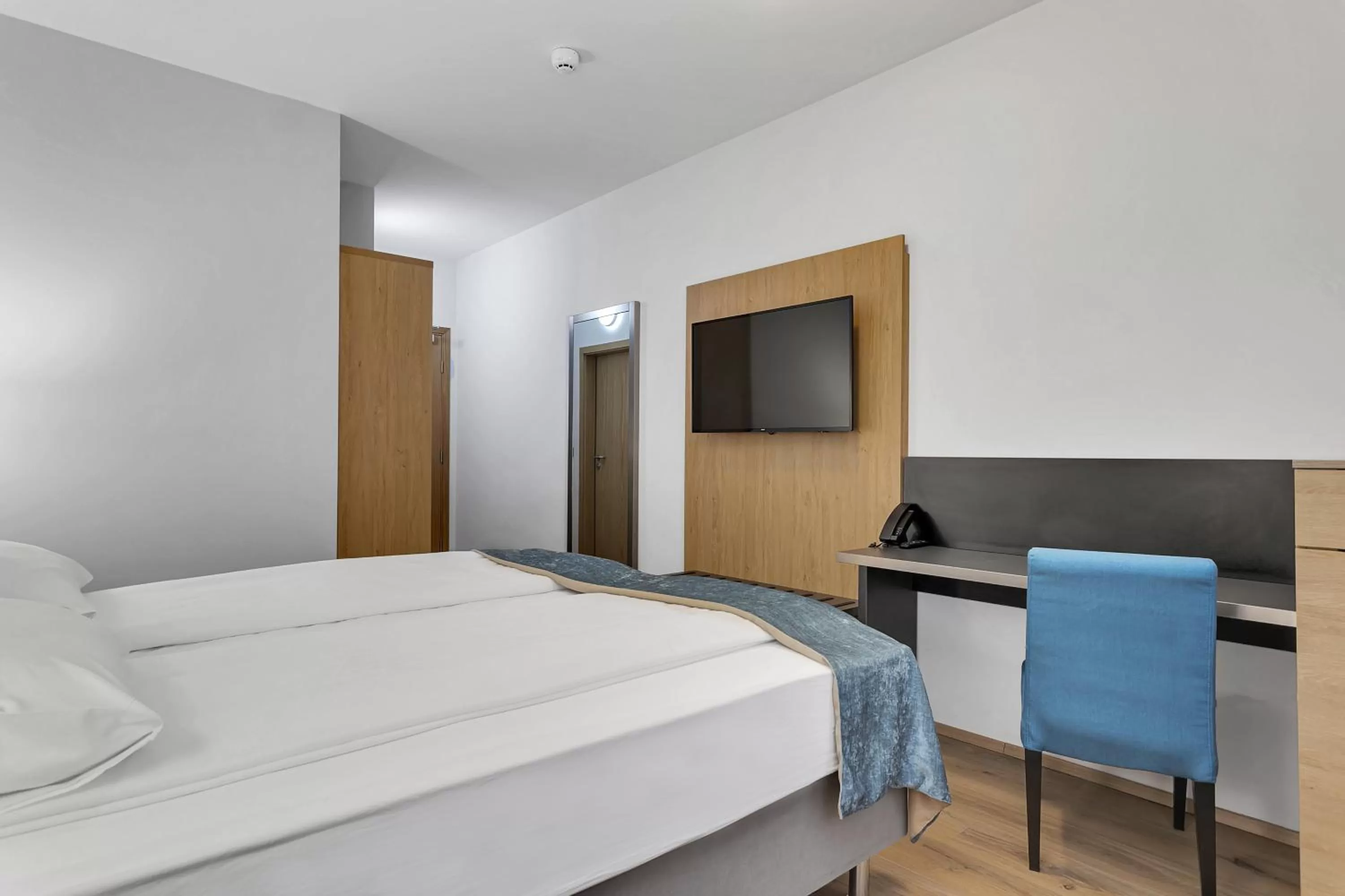 Bed in Aurora Hotel at Reykjavik-Keflavik Airport Terminal KEF