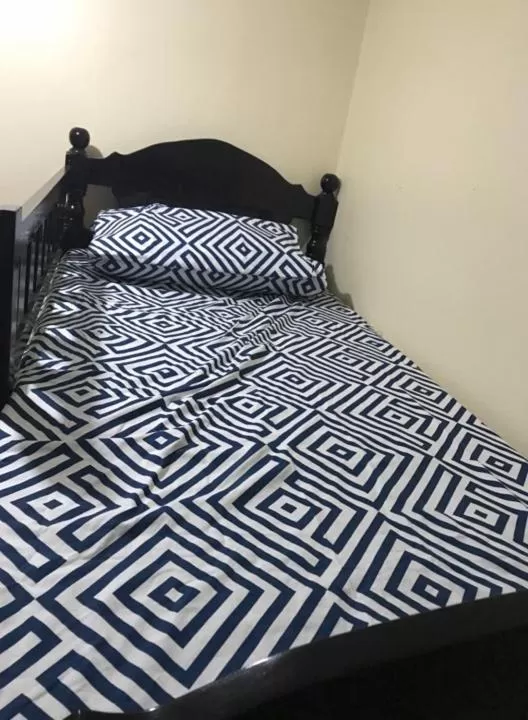 Bed in RV3 TRANSIENT HOUSE