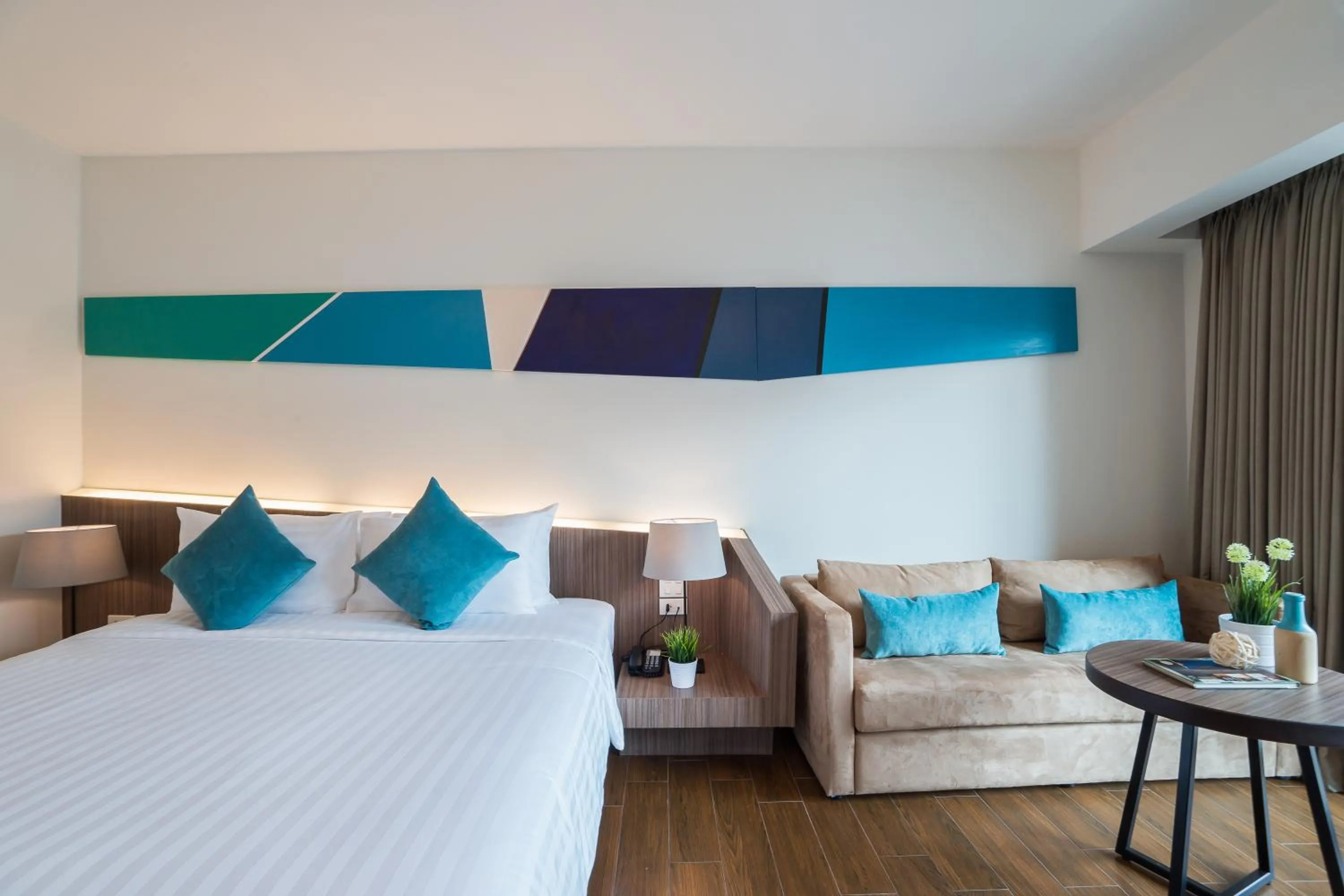 Bed in J Inspired Hotel Pattaya