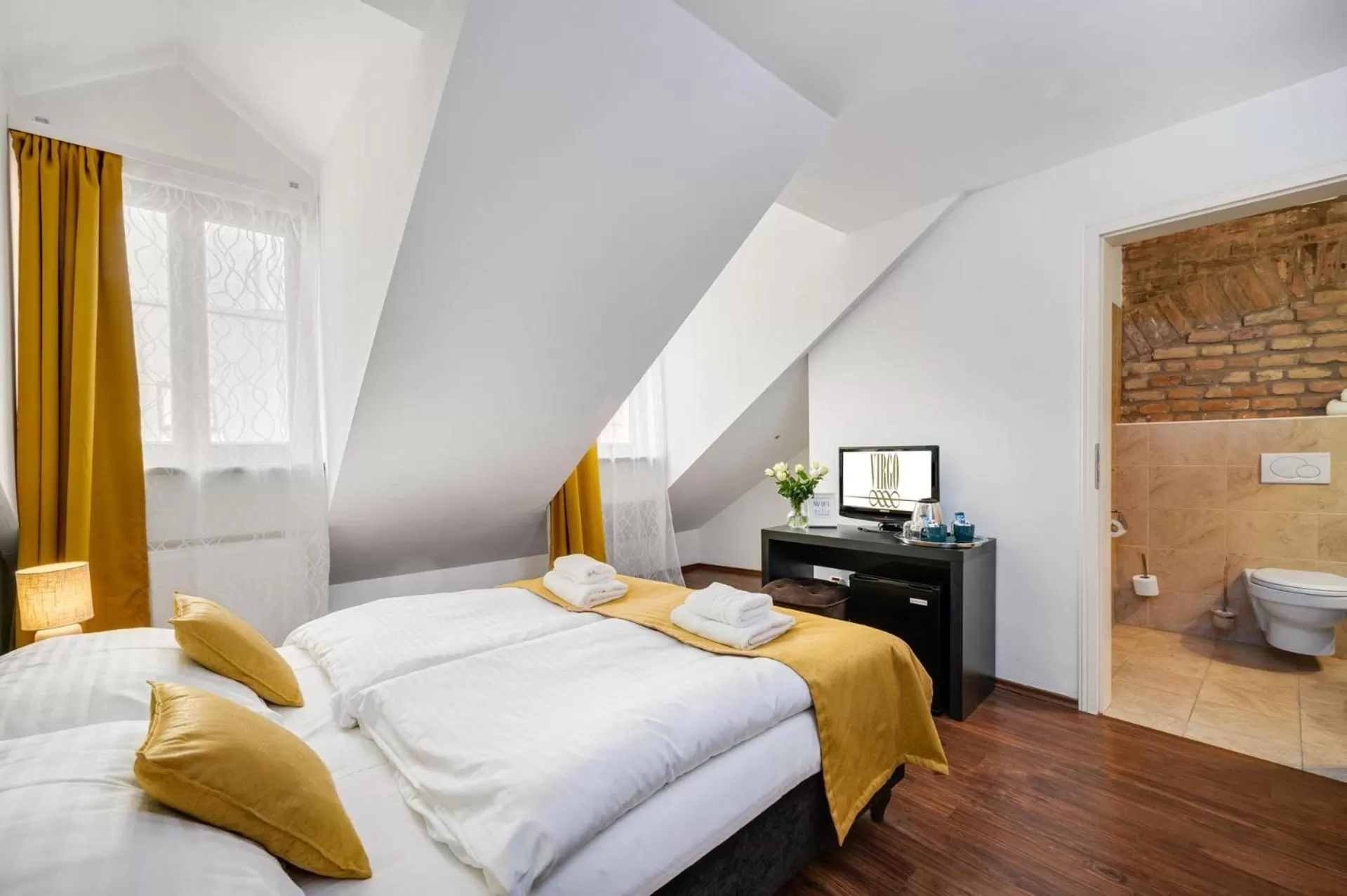 Photo of the whole room, Bed in Garni Hotel VIRGO