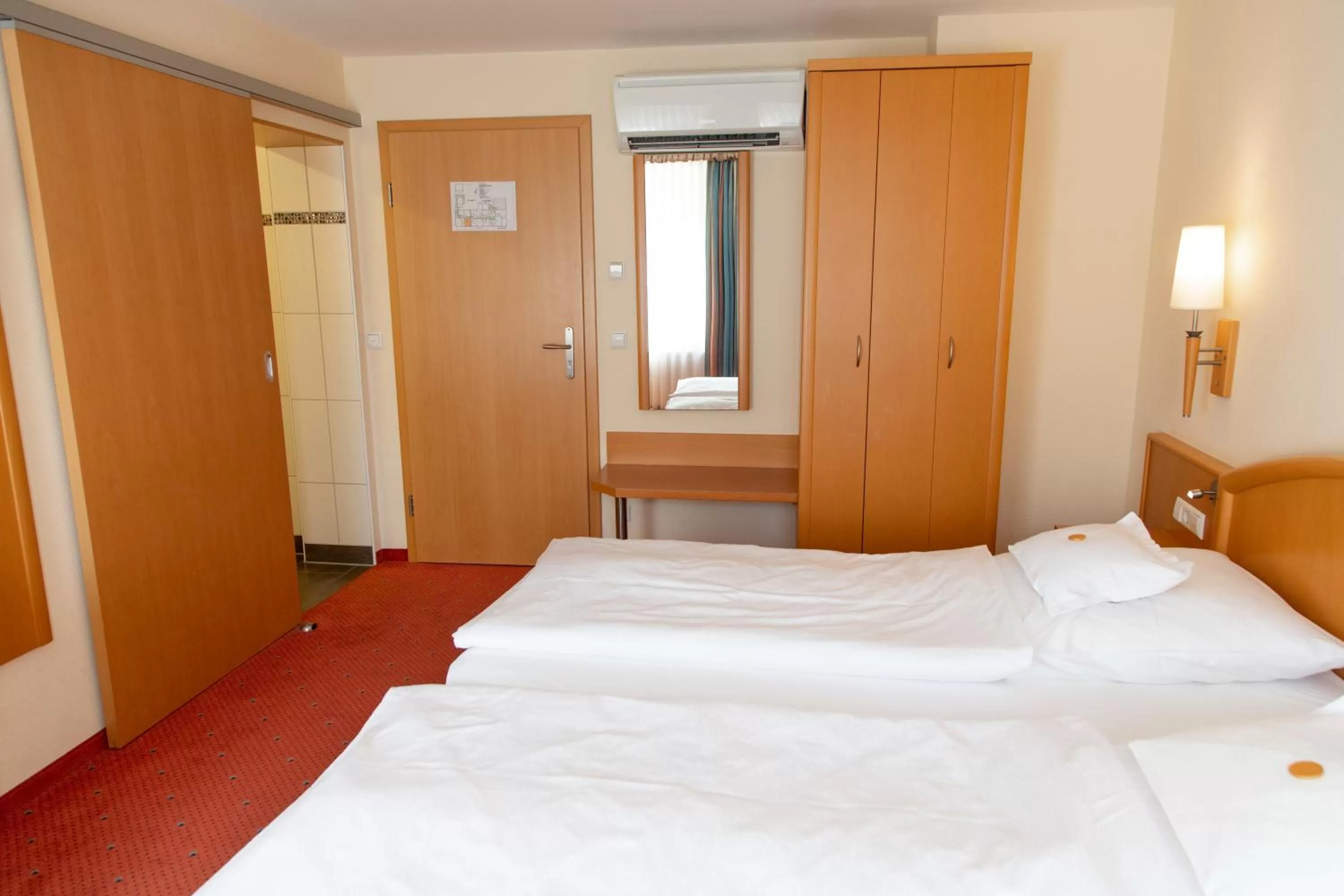 Bed in Flair Hotel Deutsches Haus