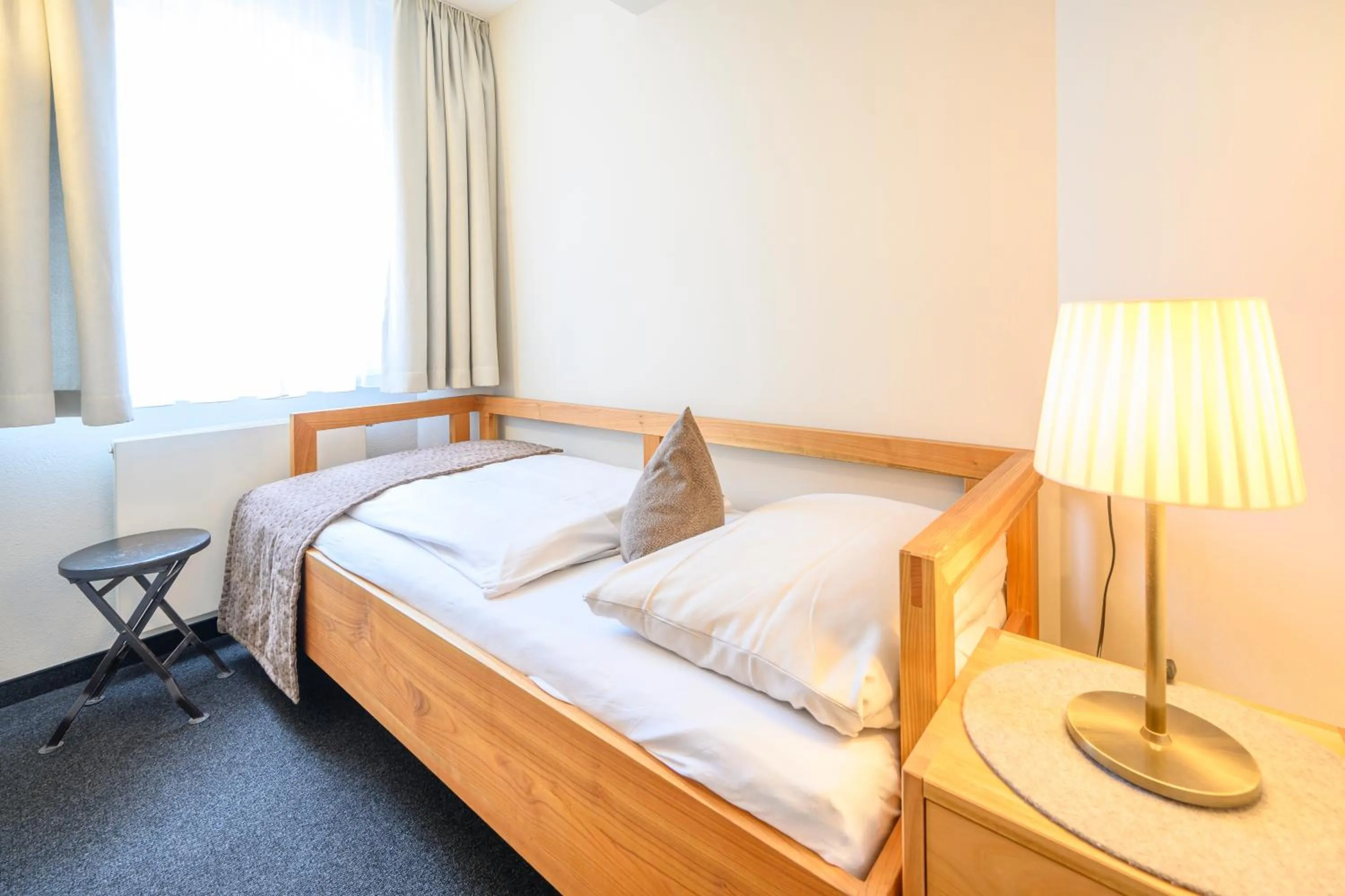 Photo of the whole room, Bed in Biohotel Garmischer Hof