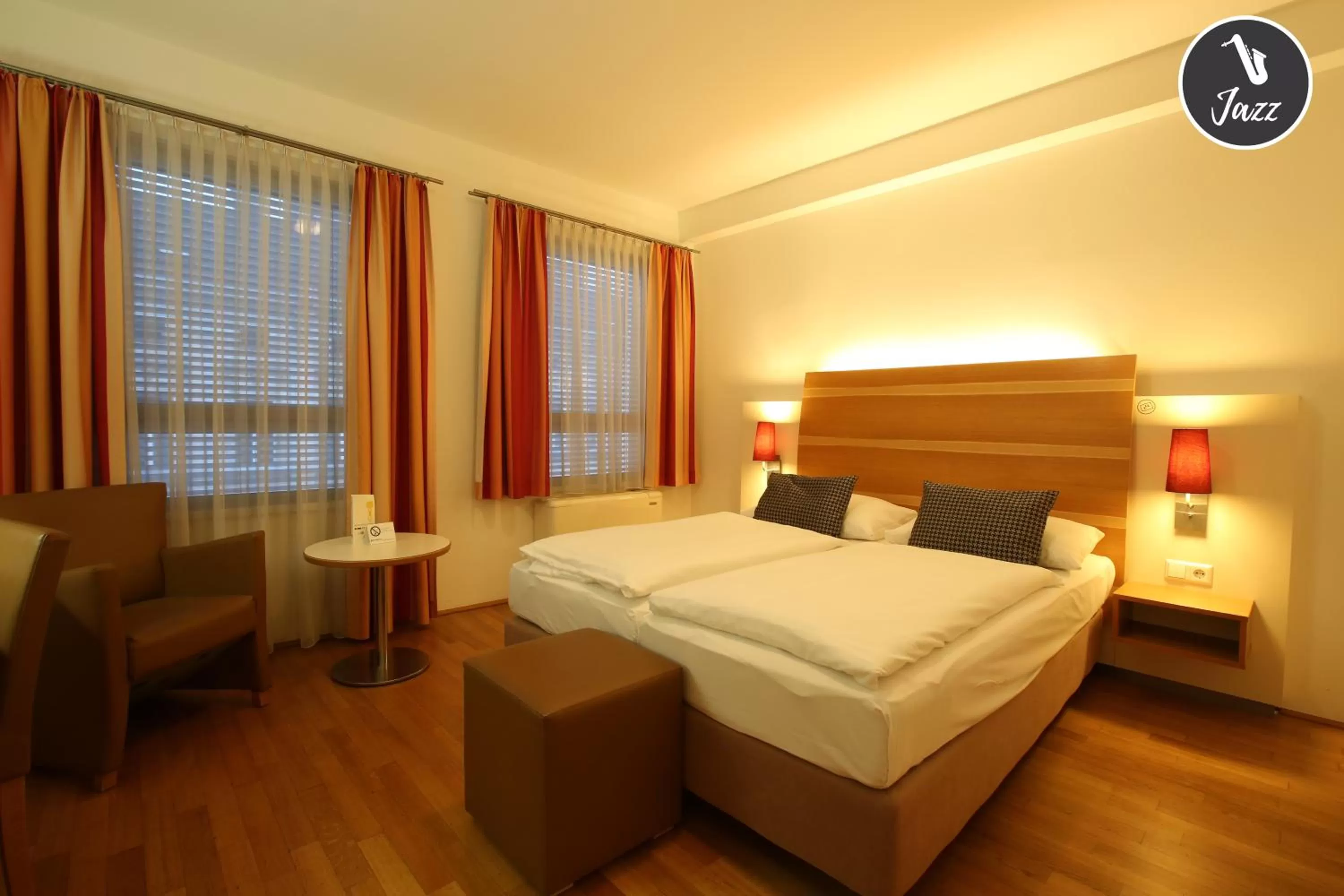 Seating area, Bed in arte Hotel Wien Stadthalle