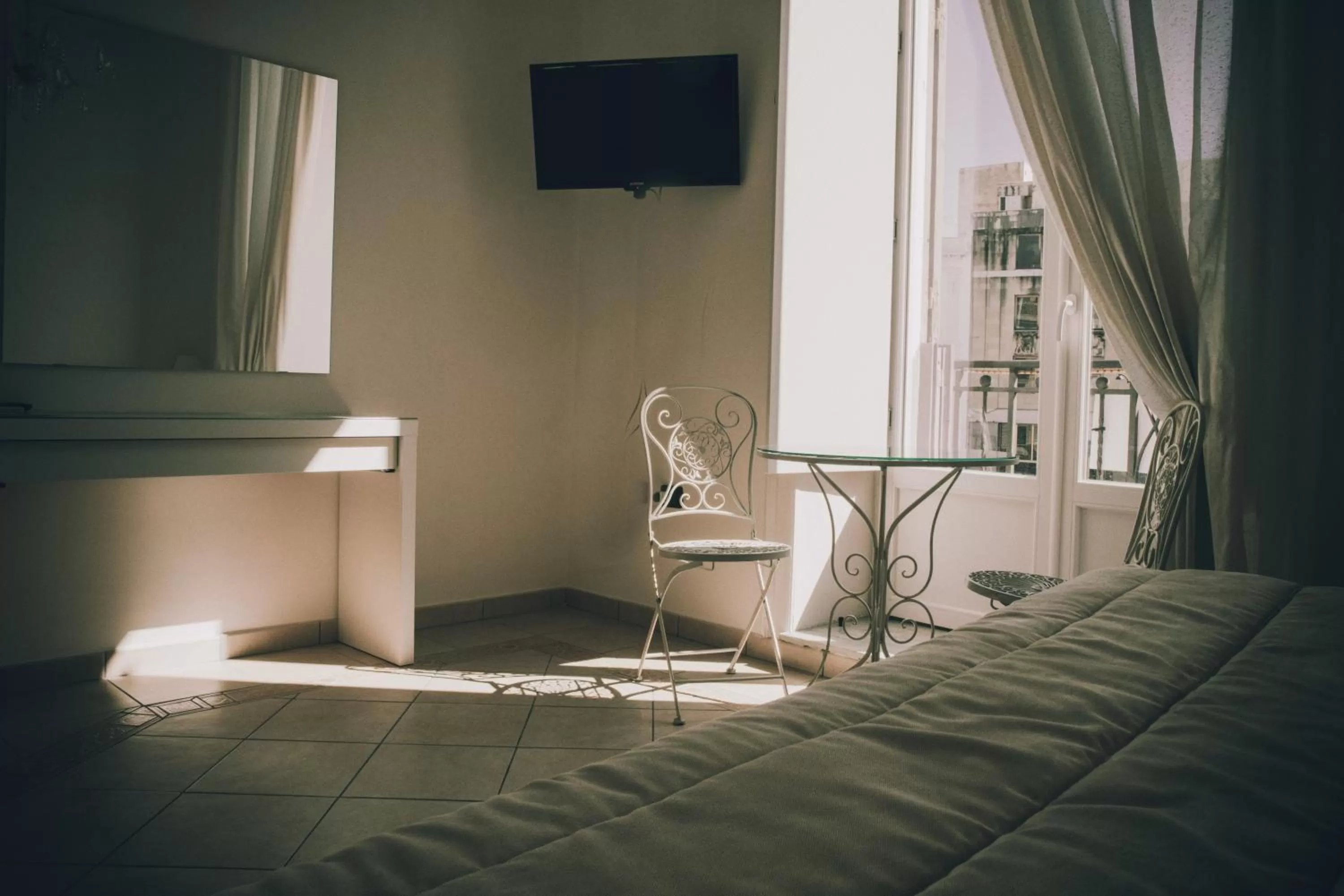 Bed, TV/Entertainment Center in B&B Diana