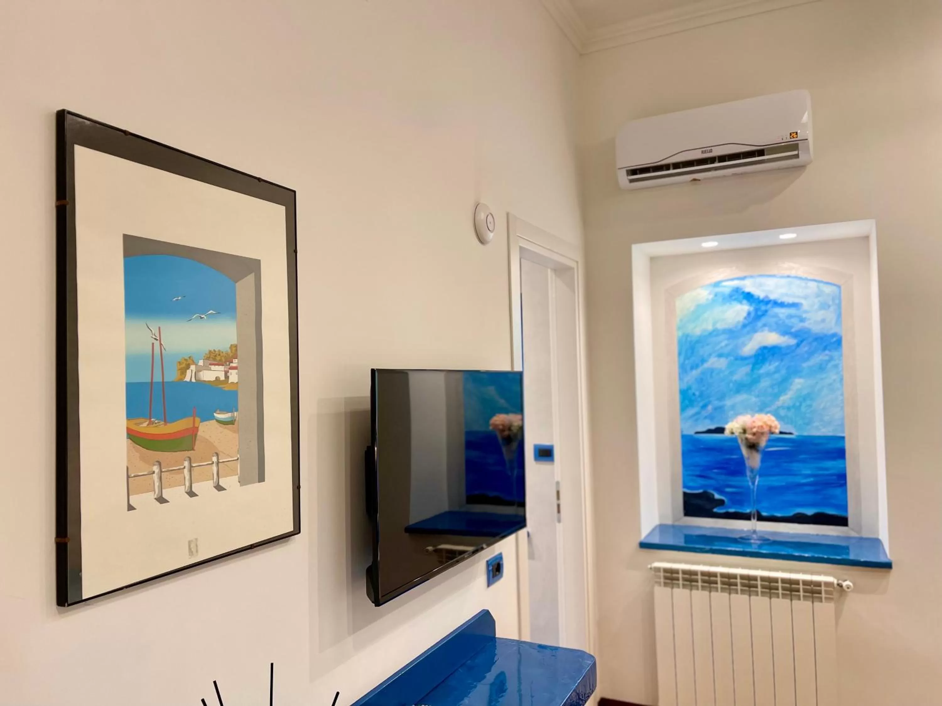 TV/Entertainment Center in Tribus Boutique Hotel