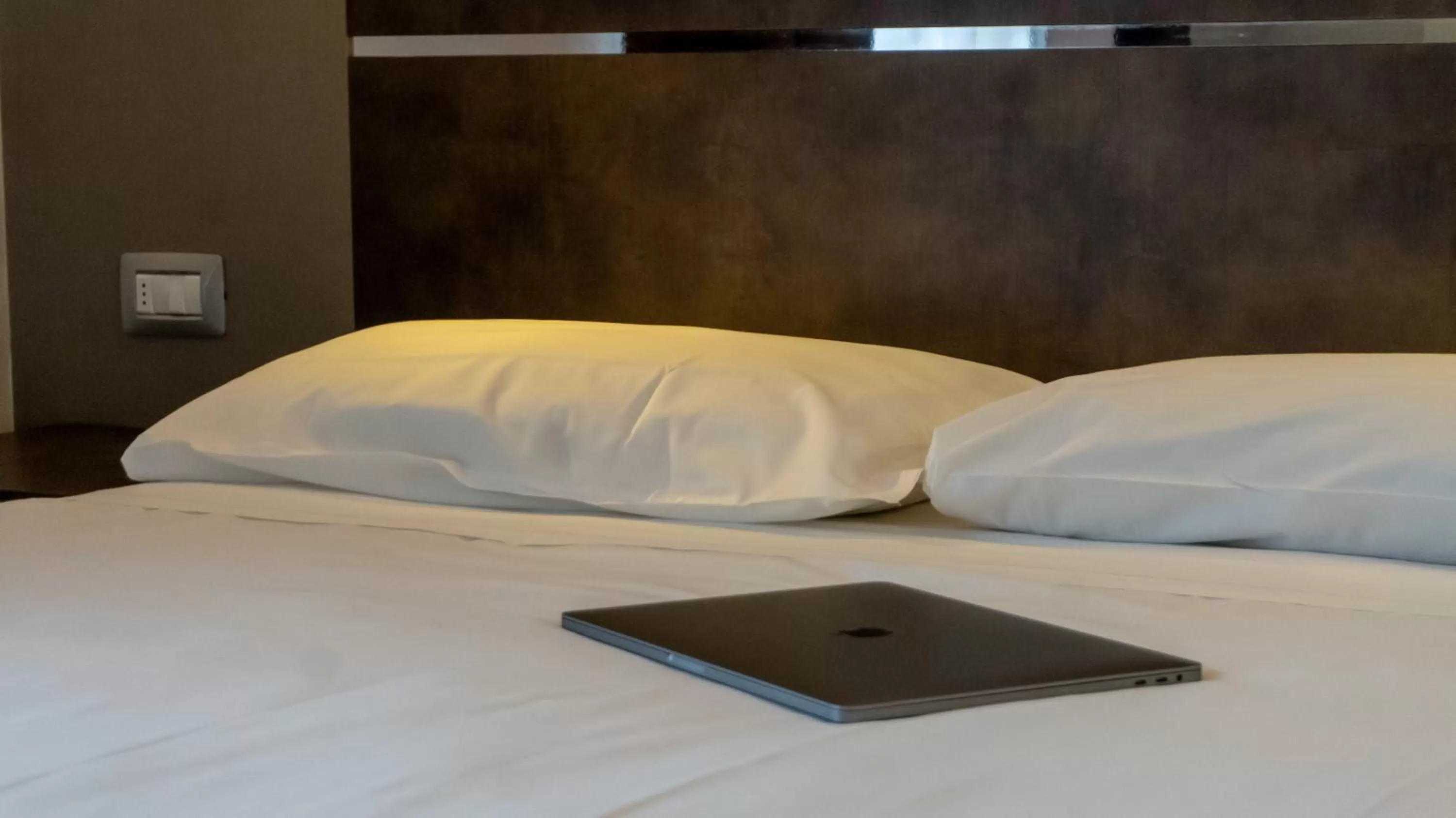 Bed in AMEDIA Hotel