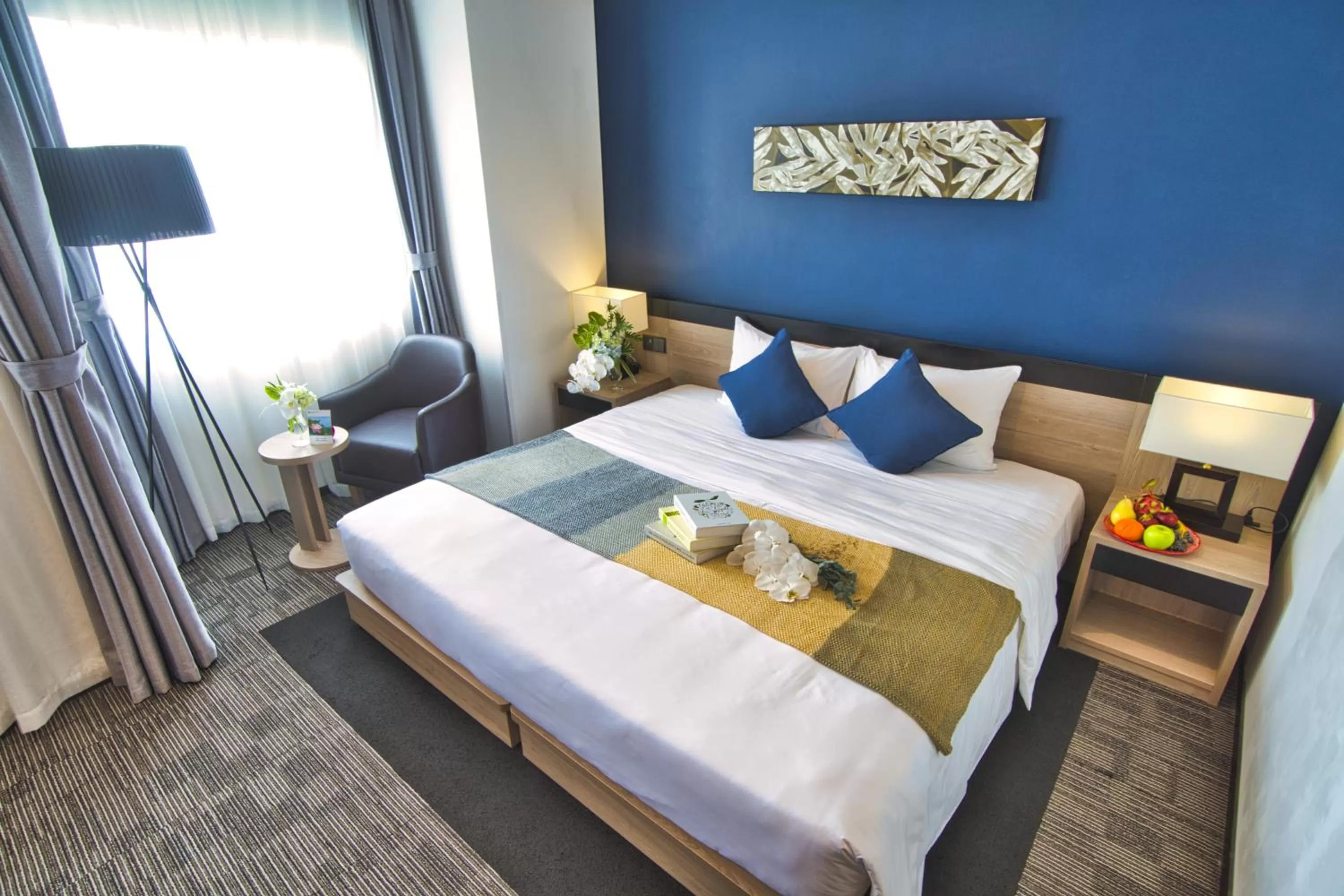 Seating area, Bed in Roygent Parks Hanoi