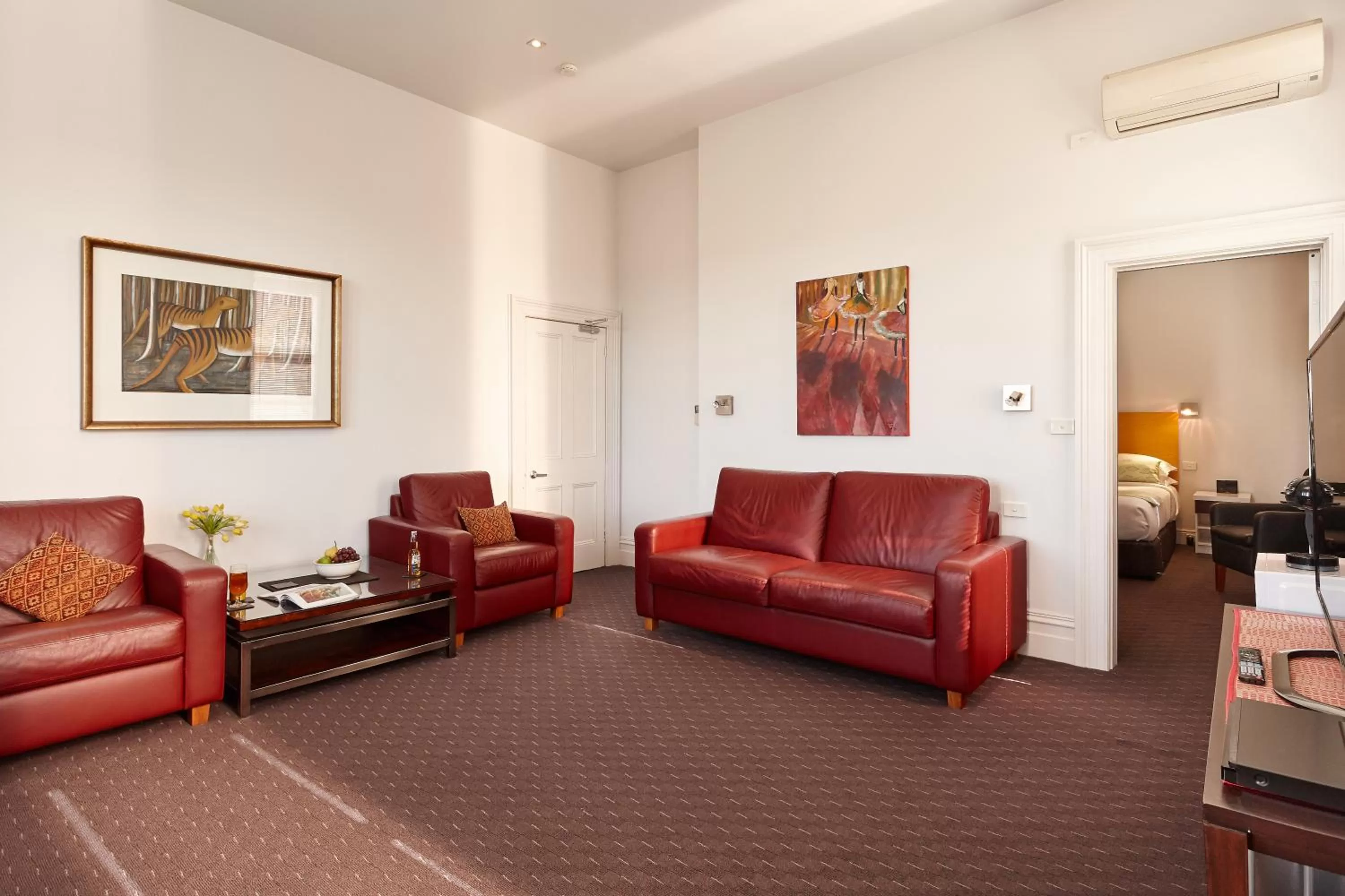 Communal lounge/ TV room in Auldington Hotel