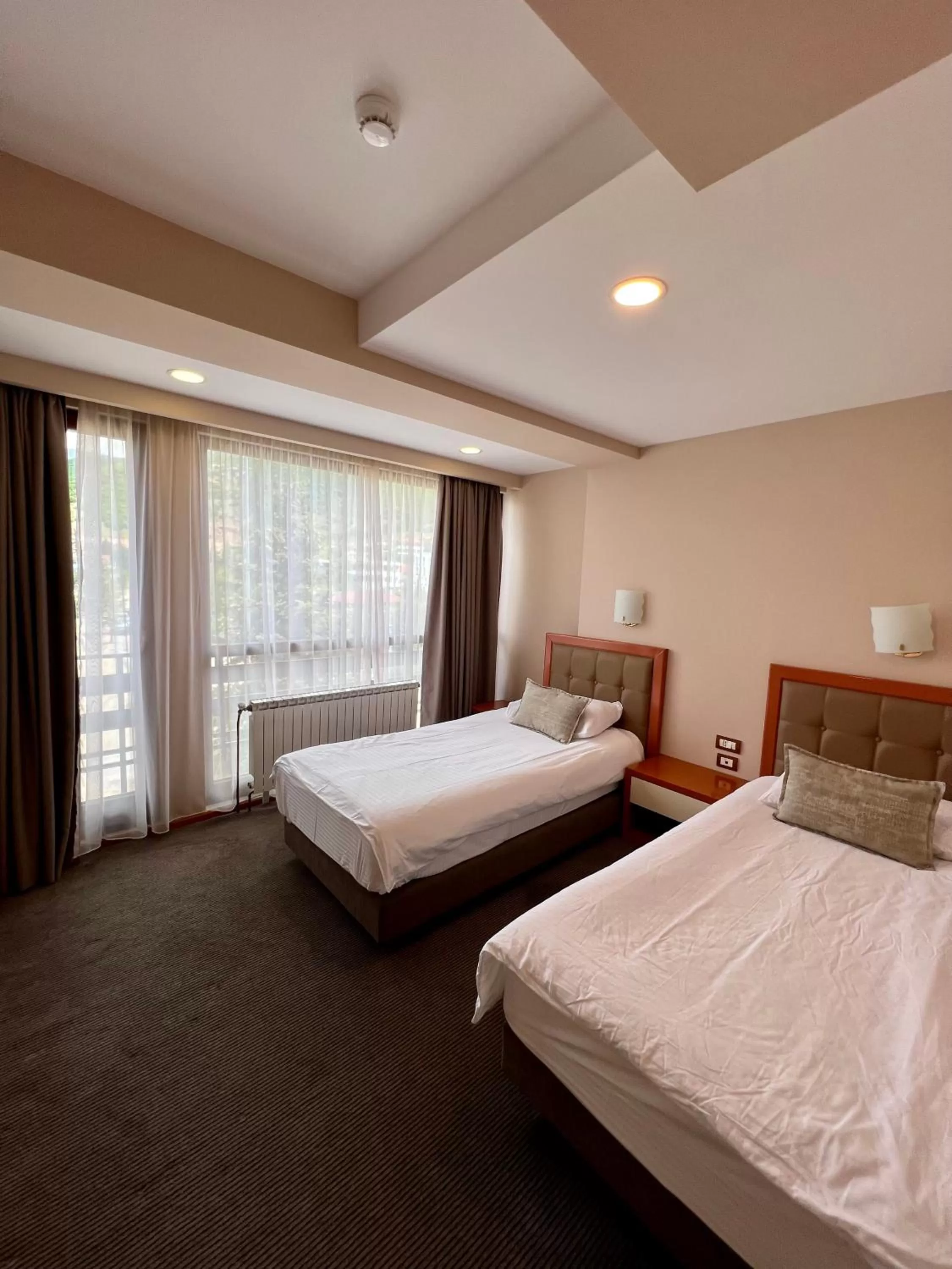 Bed in Hotel Millennium