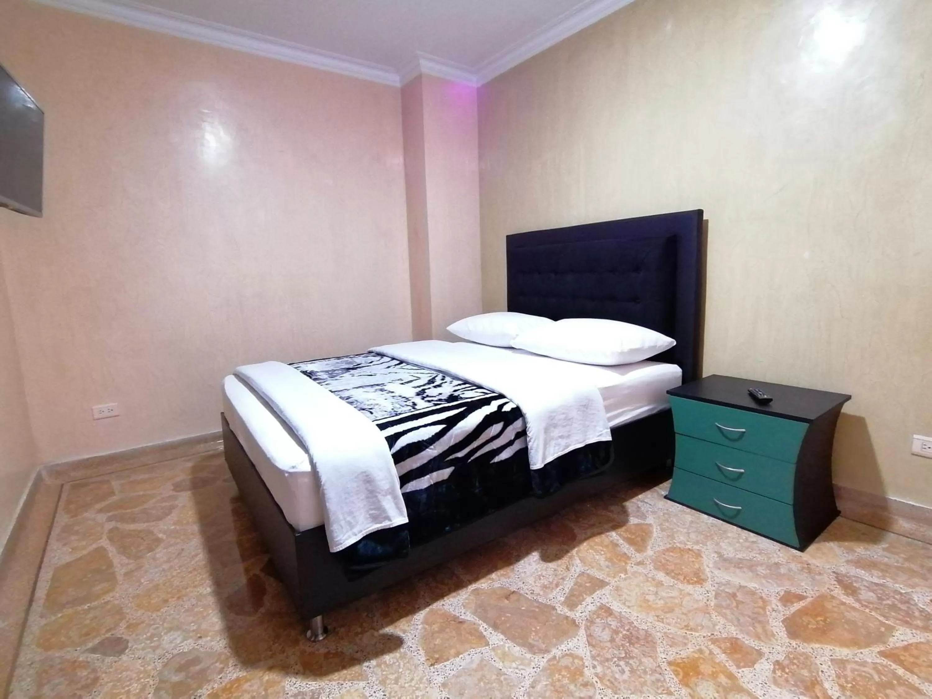 Bed in HOTEL GOLDEN SUITE