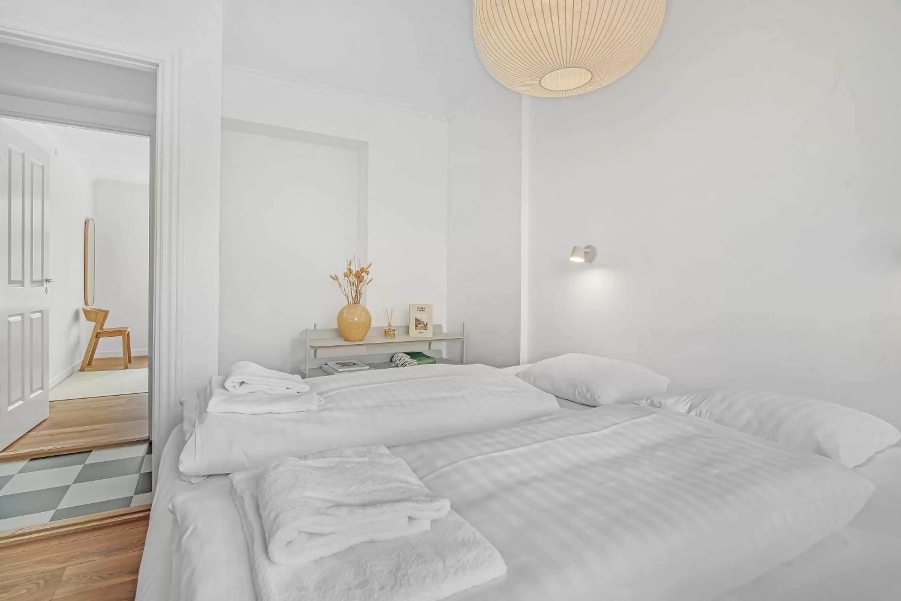 Bed in NABO Hotel Apartments