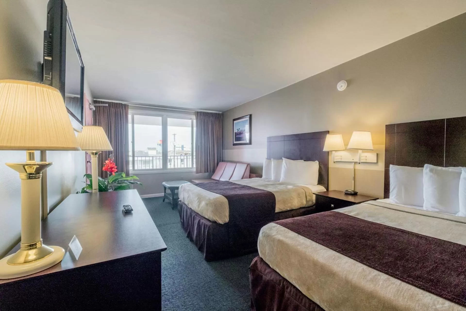 Bed in Heart of Wildwood Boardwalk Motel