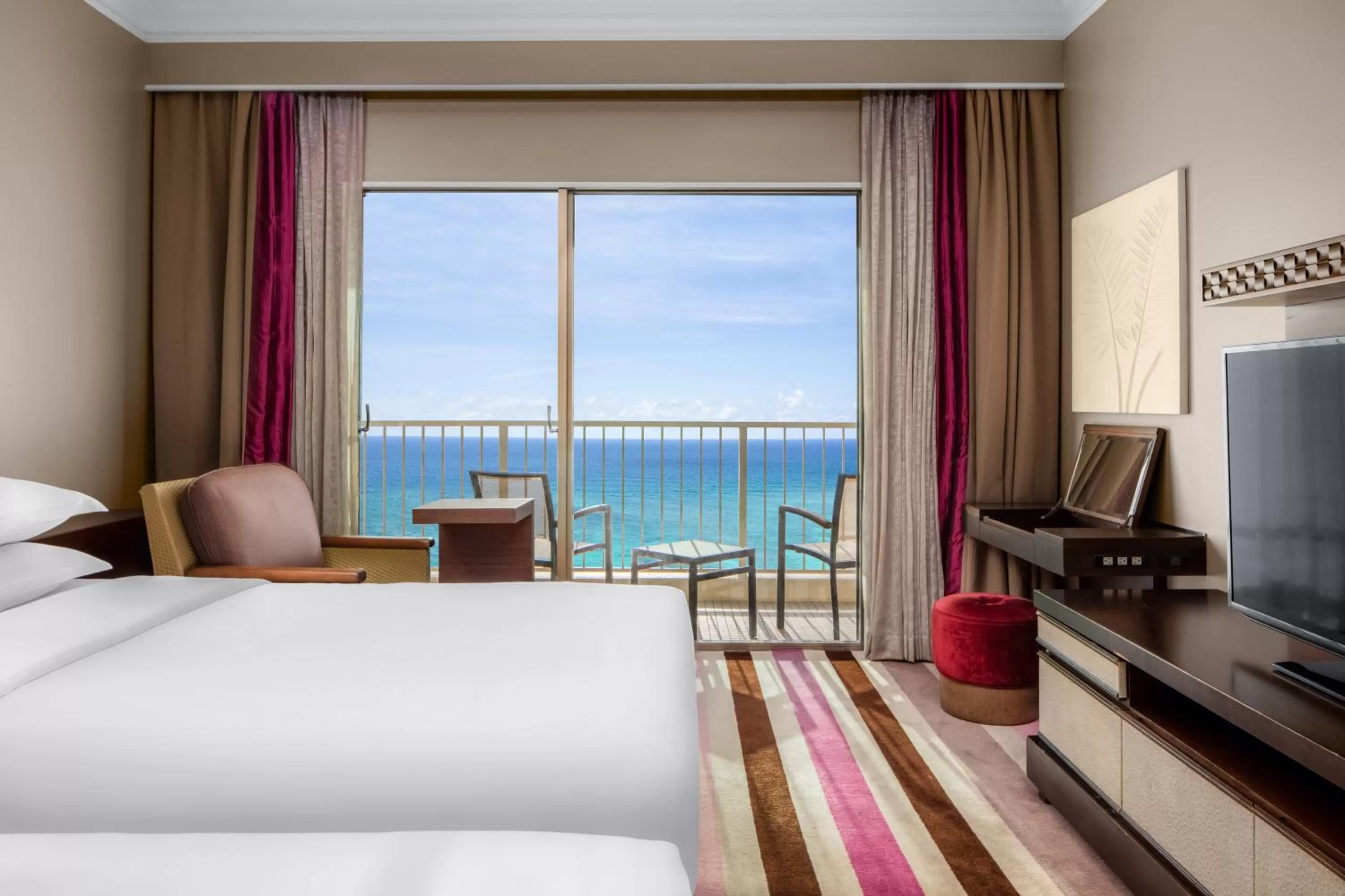 Bed in RIHGA Royal Laguna Guam Resort