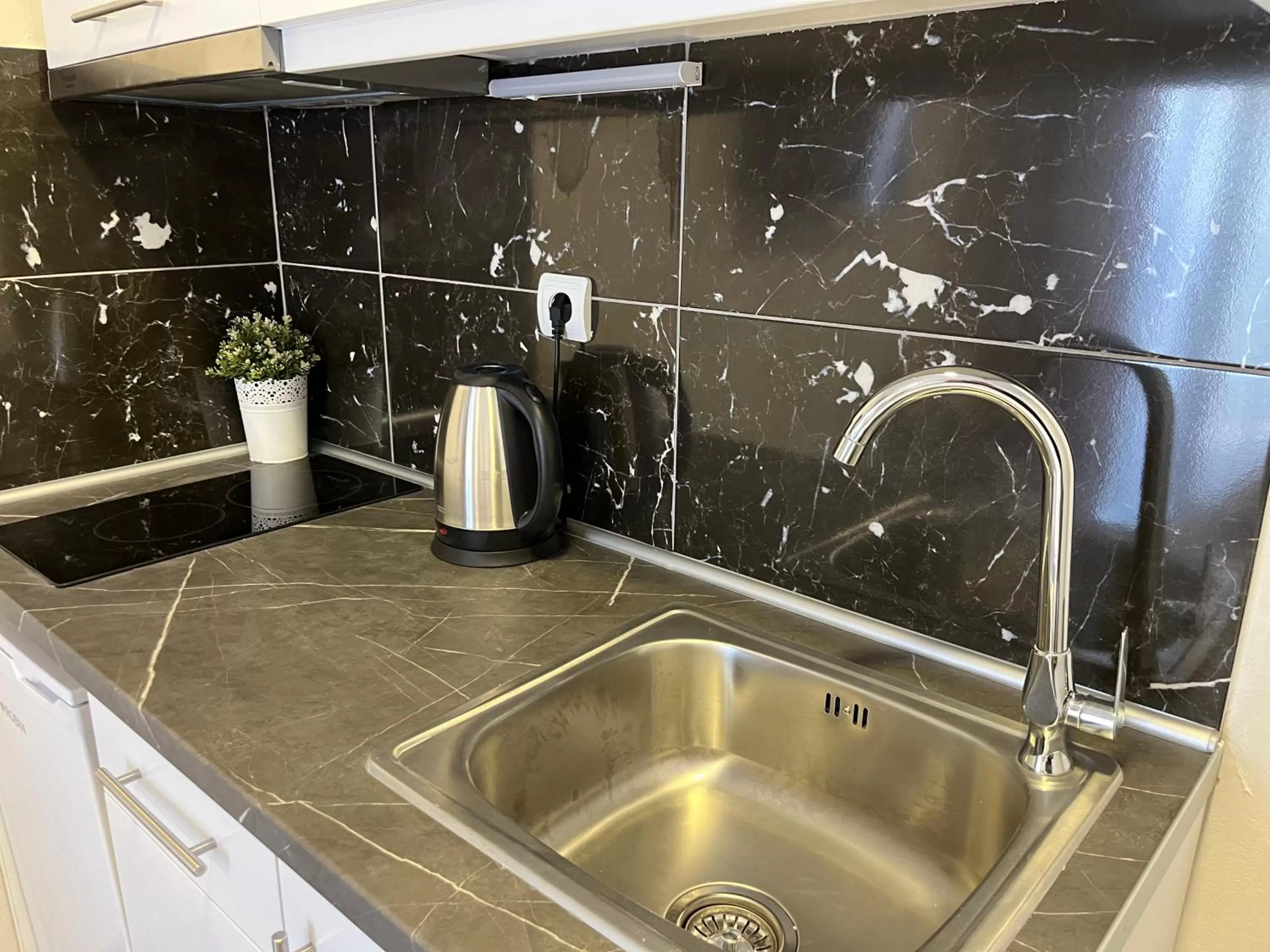 Kitchen or kitchenette in Aegean Blue Seaview Studios