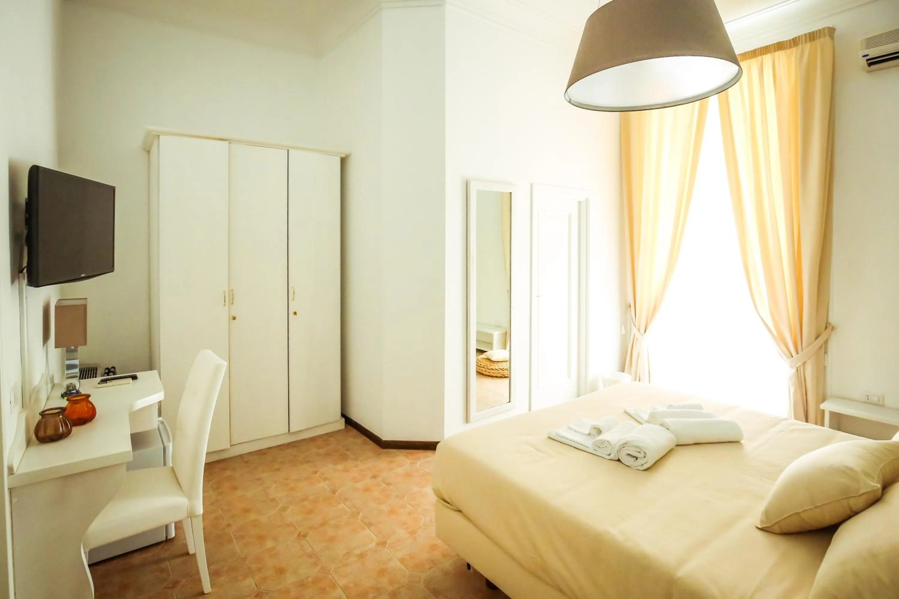 Bed in NapoliMia Boutique Hotel