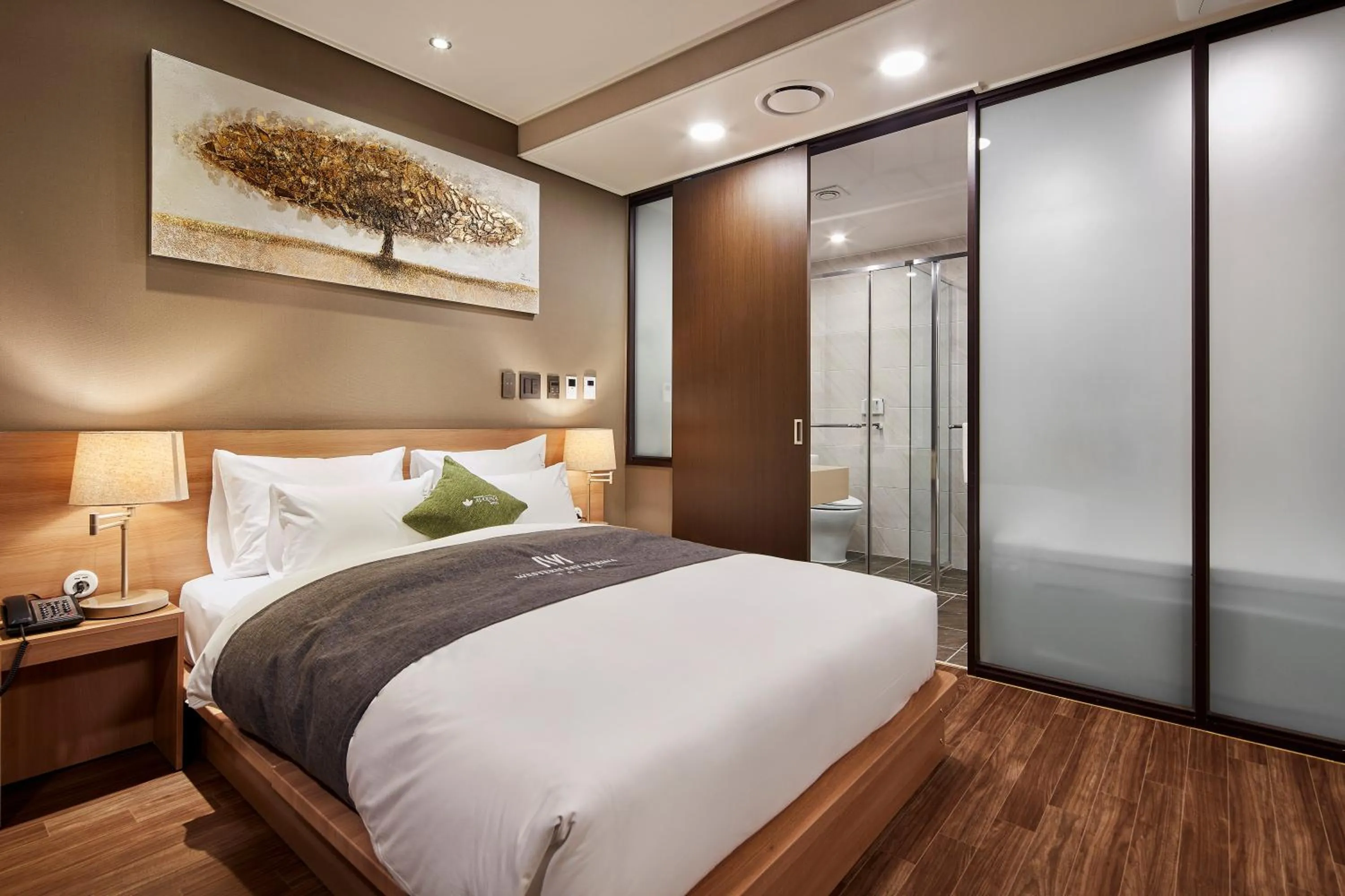 Bed in Western Bay Marina Hotel