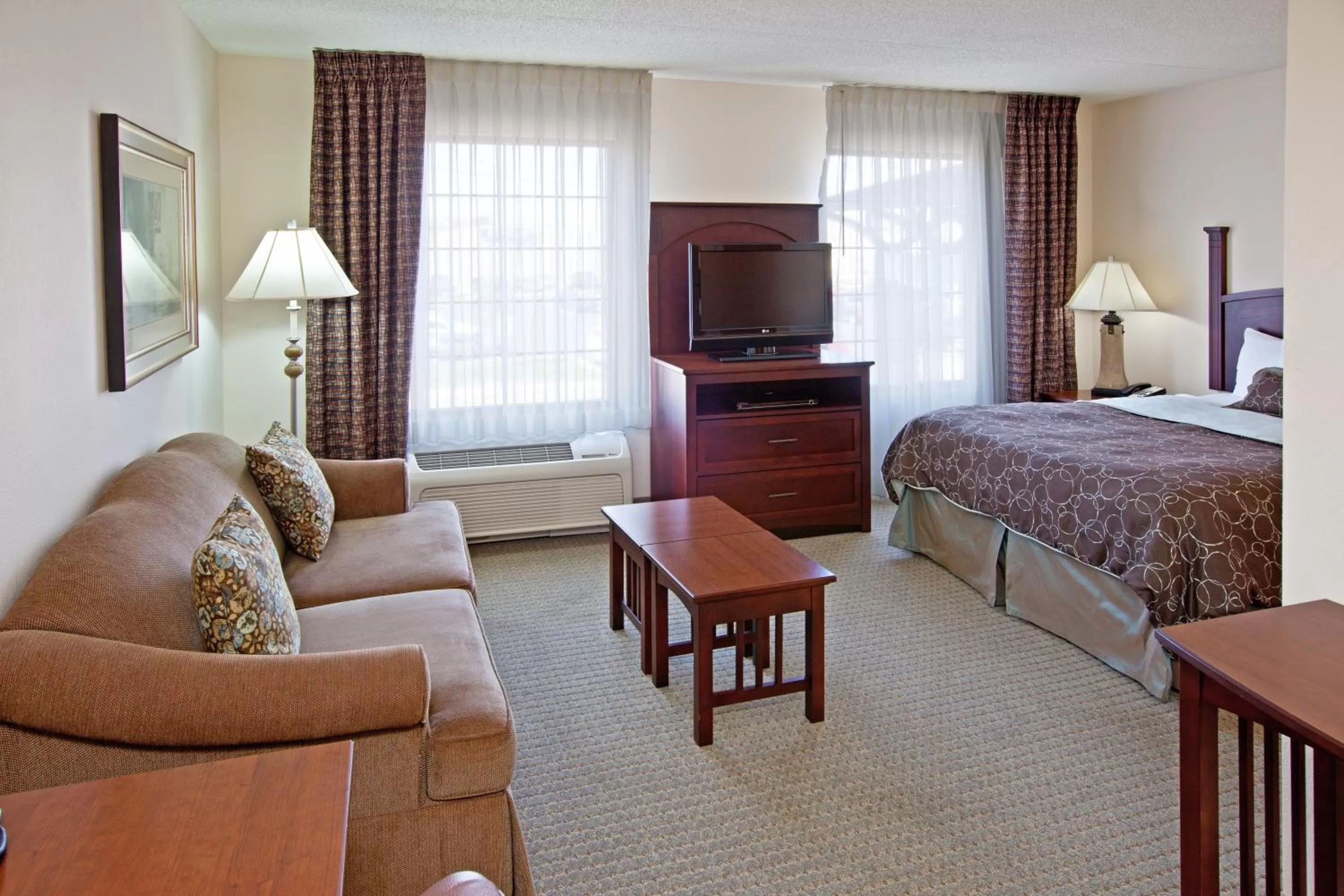 Living room, Bed in Staybridge Suites Indianapolis Downtown-Convention Center by IHG