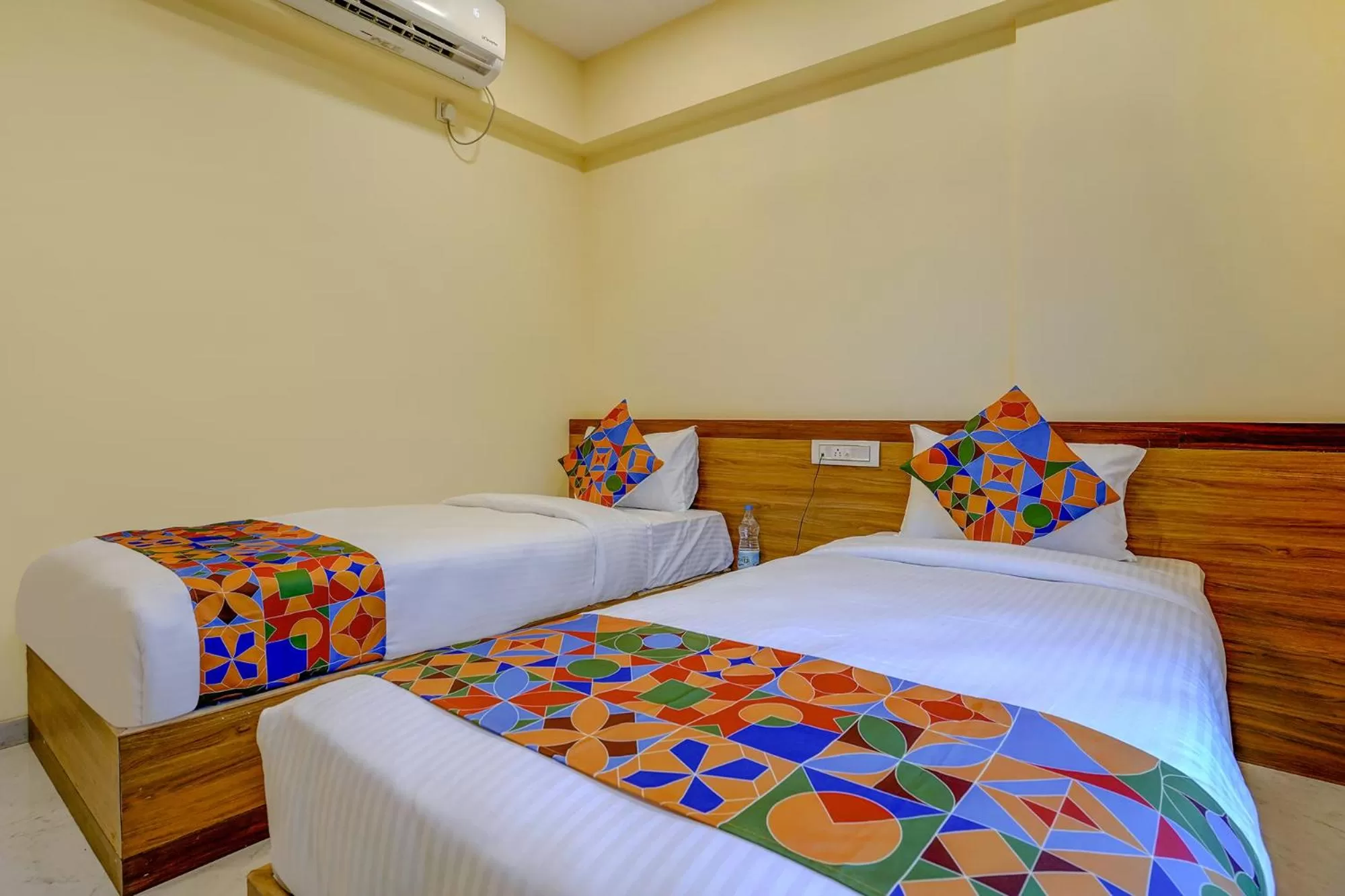 Bed in FabHotel Crystal Homes - nr Rajaram Bhiku stadium