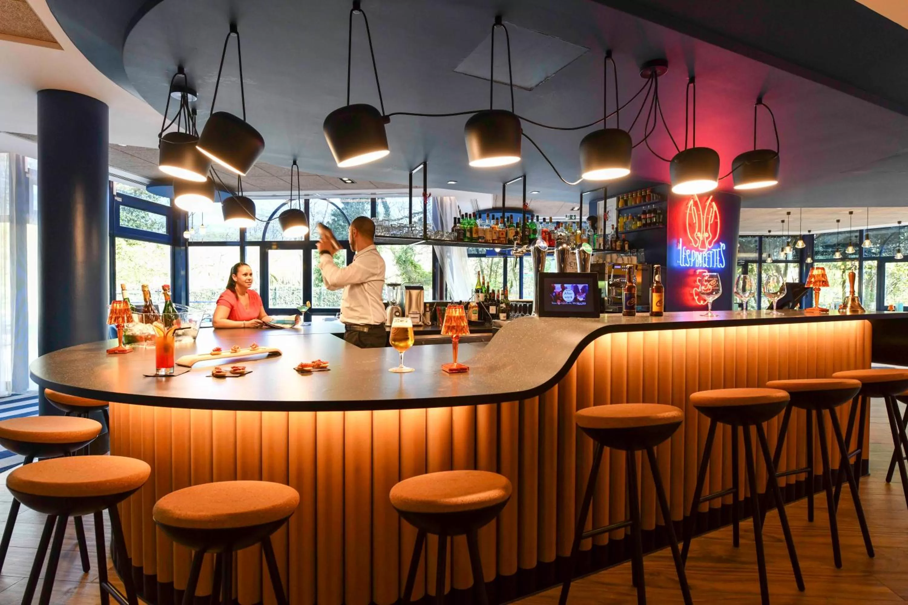 Communal lounge/ TV room in Novotel La Rochelle Centre