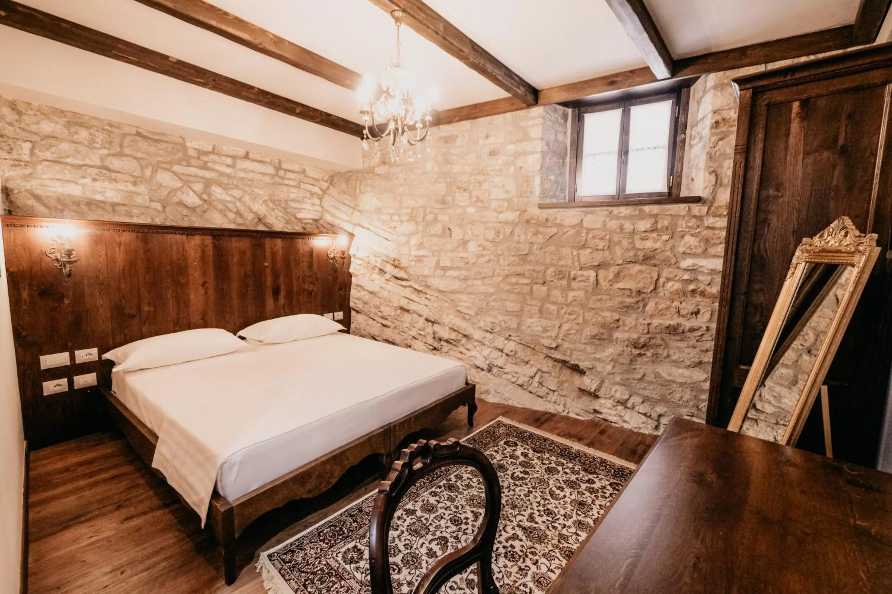 Bed in Beratino Hotel