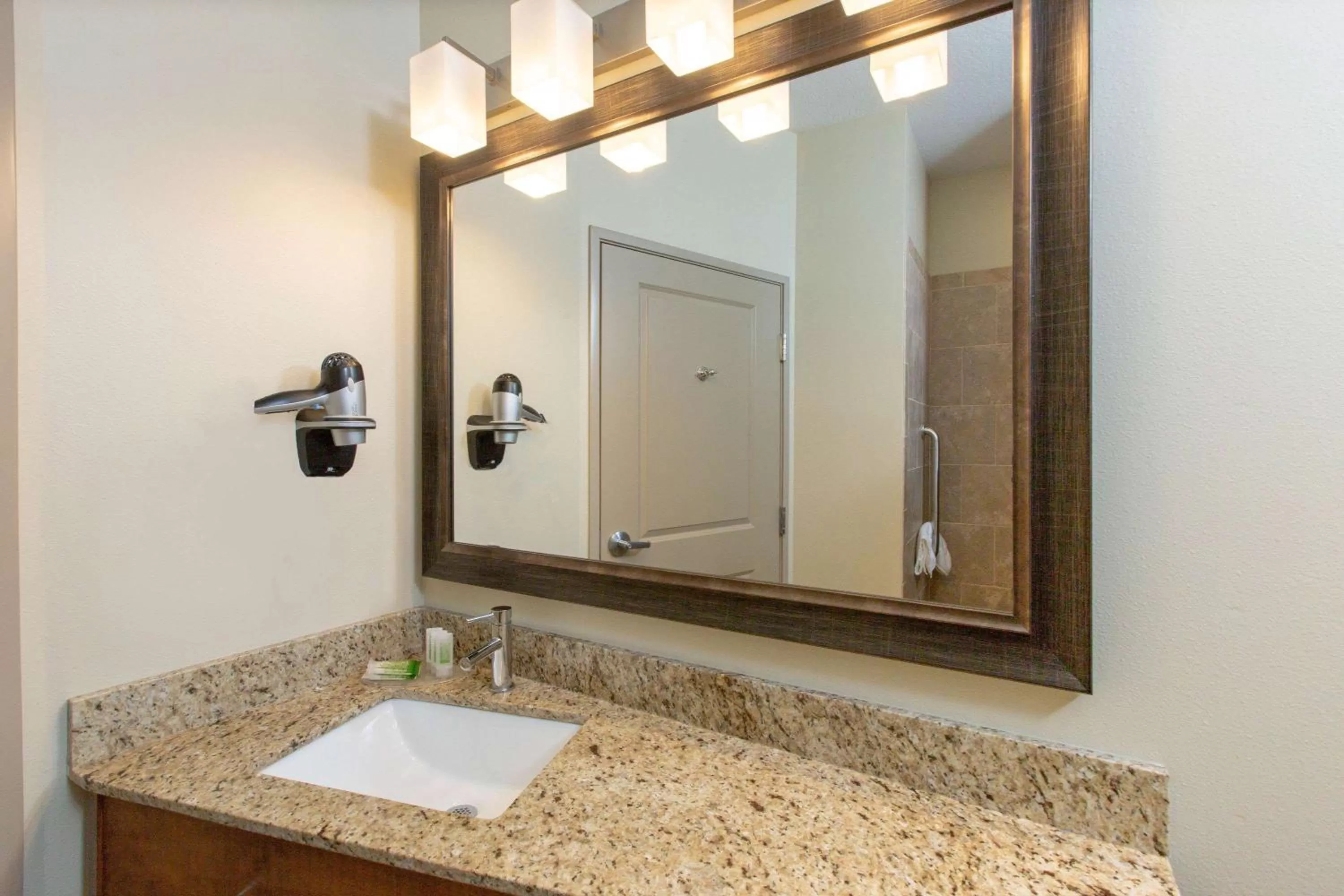 Bathroom in AmericInn by Wyndham Humboldt