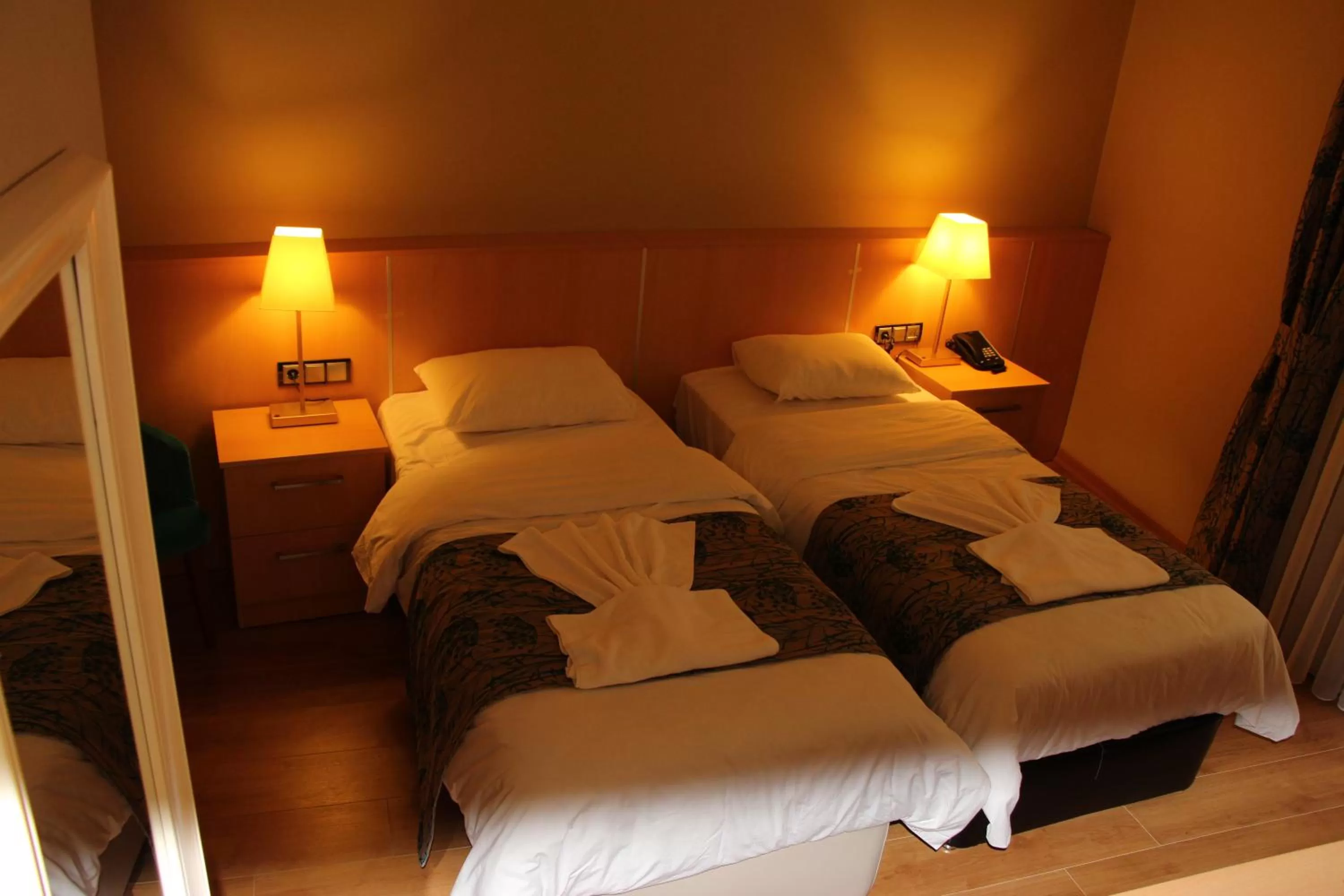 Bed in Artika Hotel