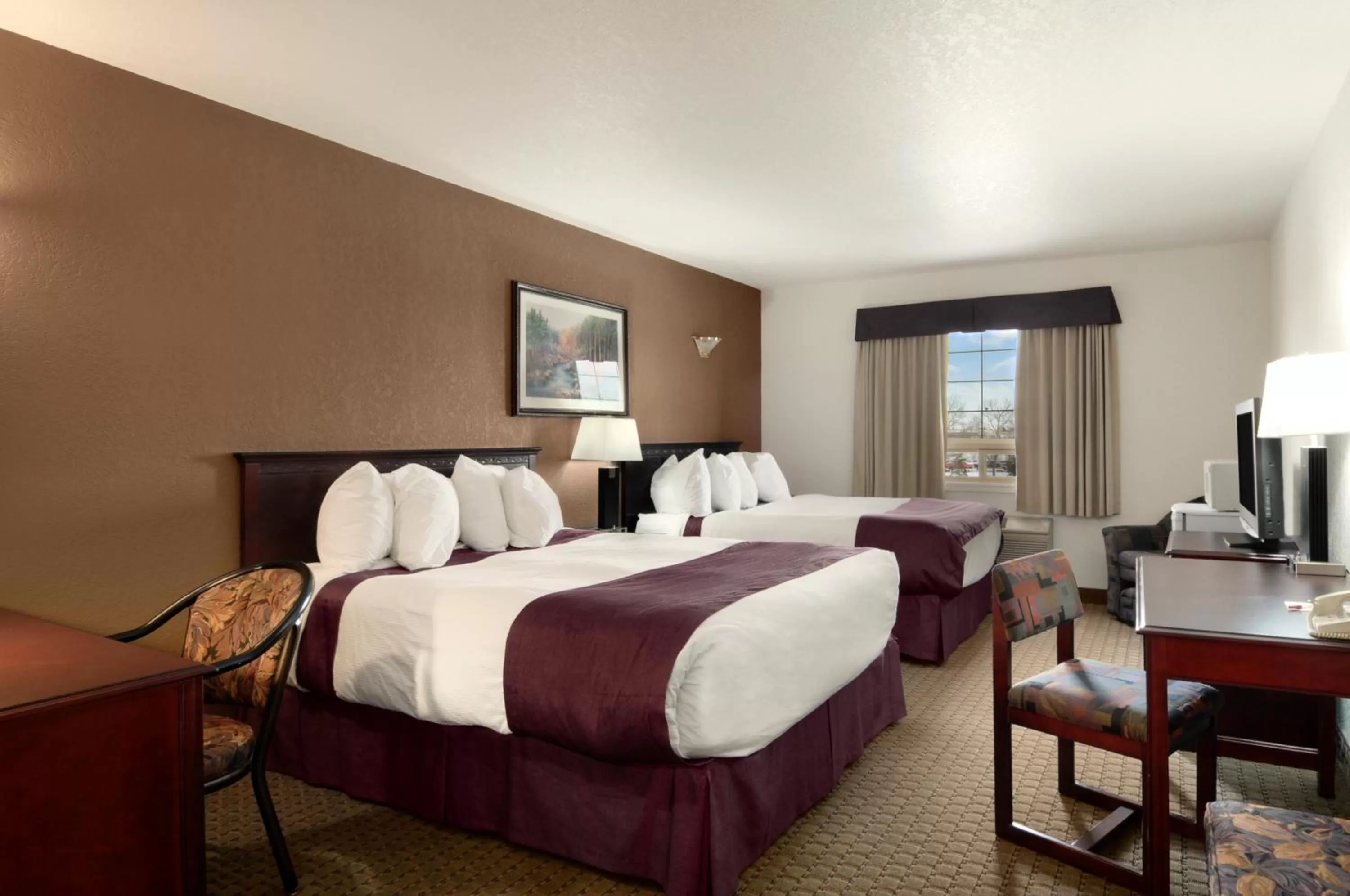 Photo of the whole room, Bed in Ramada by Wyndham Red Deer Hotel & Suites