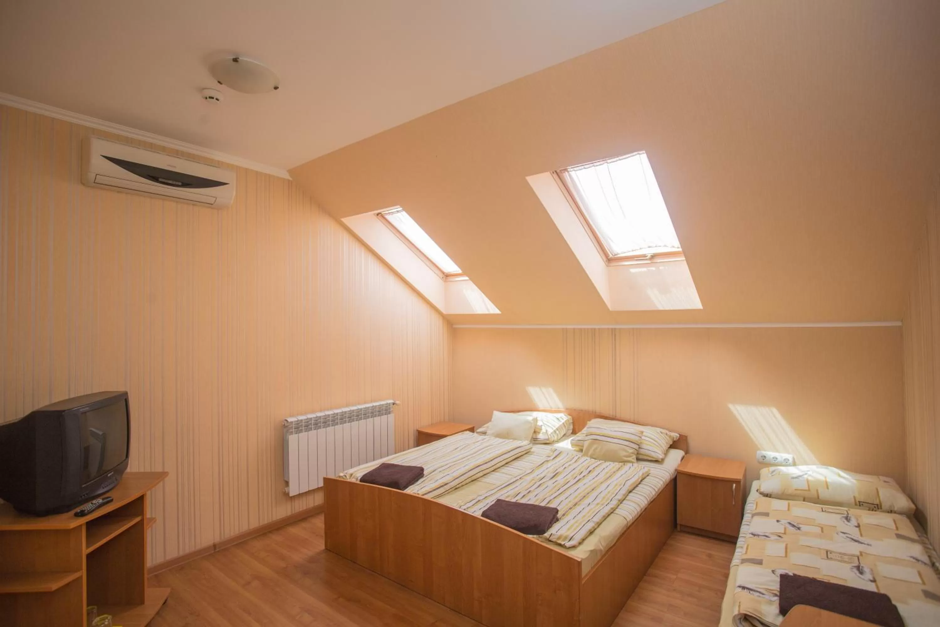 Photo of the whole room, Bed in Praktik Hotel & Restaurant