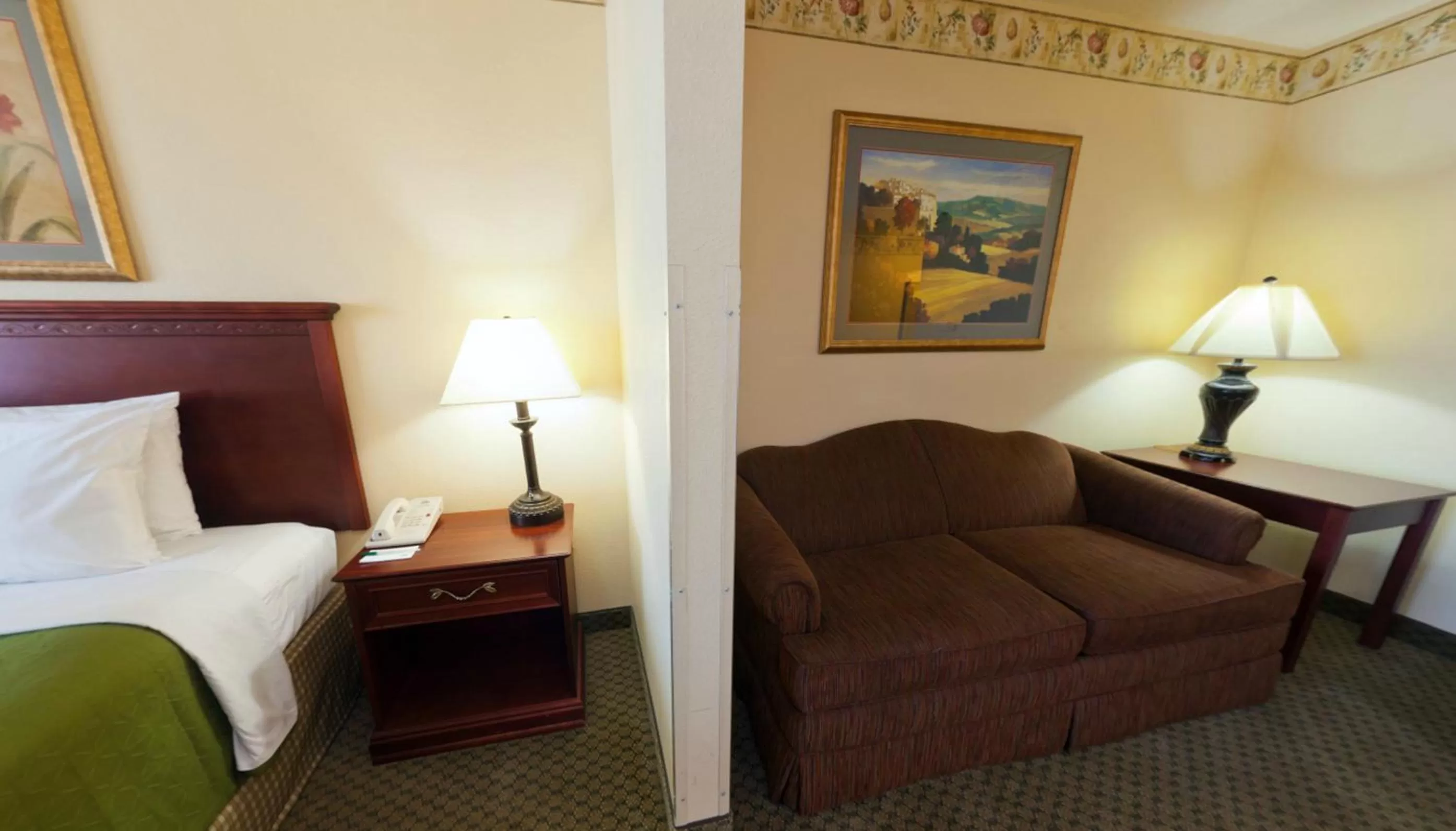 Seating area, Bed in Country Inn & Suites by Radisson, St Cloud East, MN