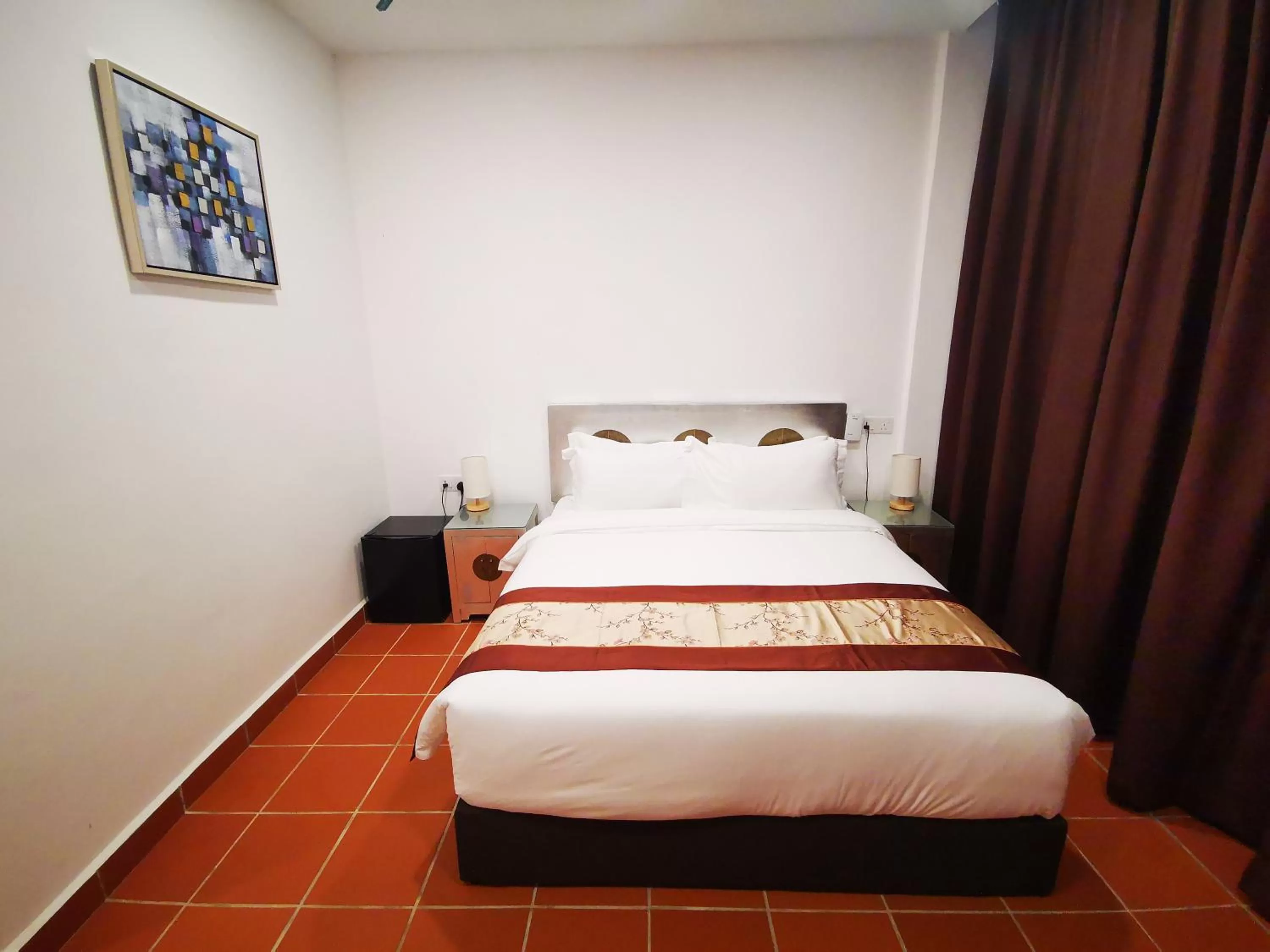 Bed in Mclane Boutique Hotel