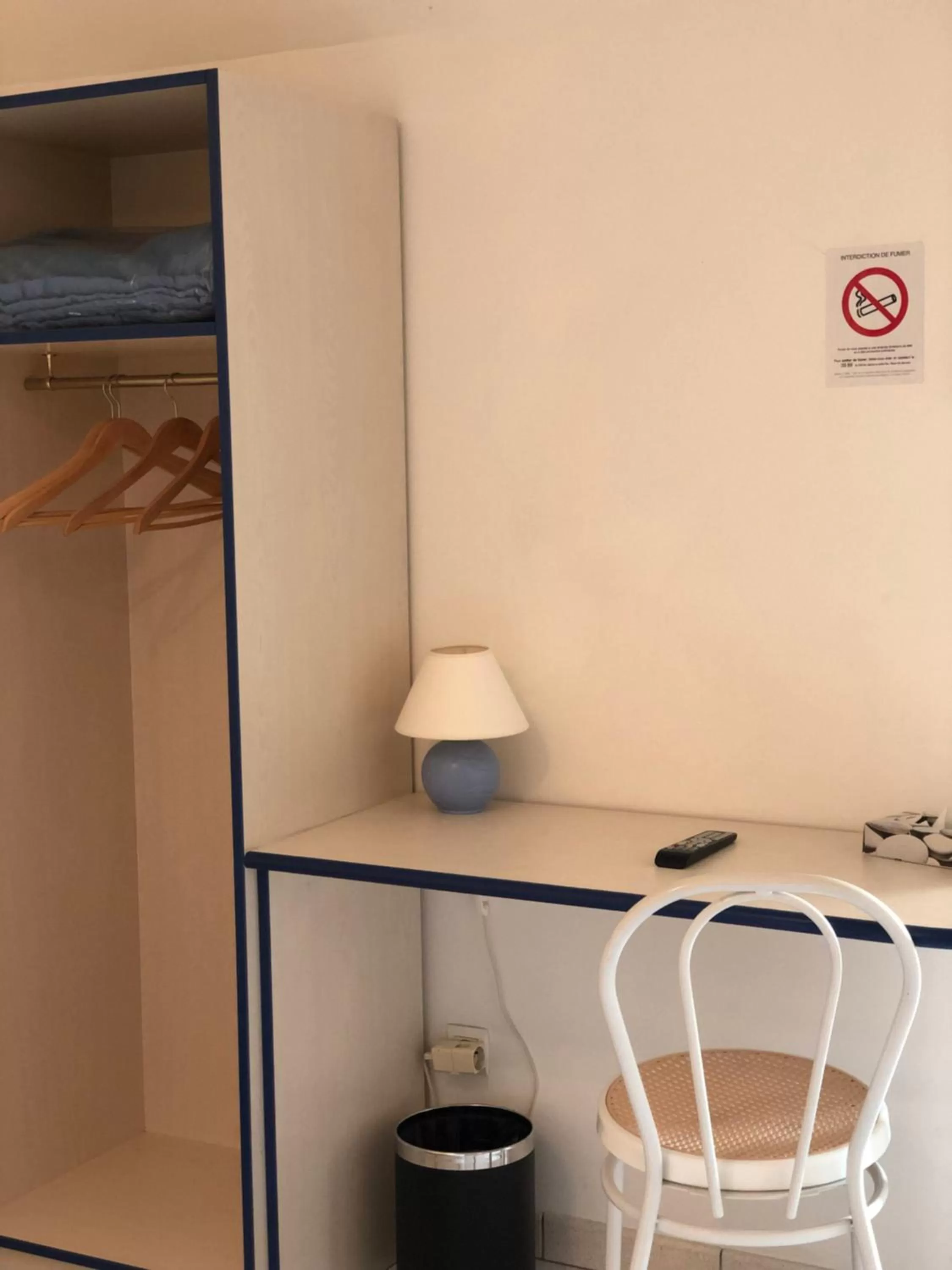 Seating area in Enzo Hotels Neufchâteau by Kyriad Direct