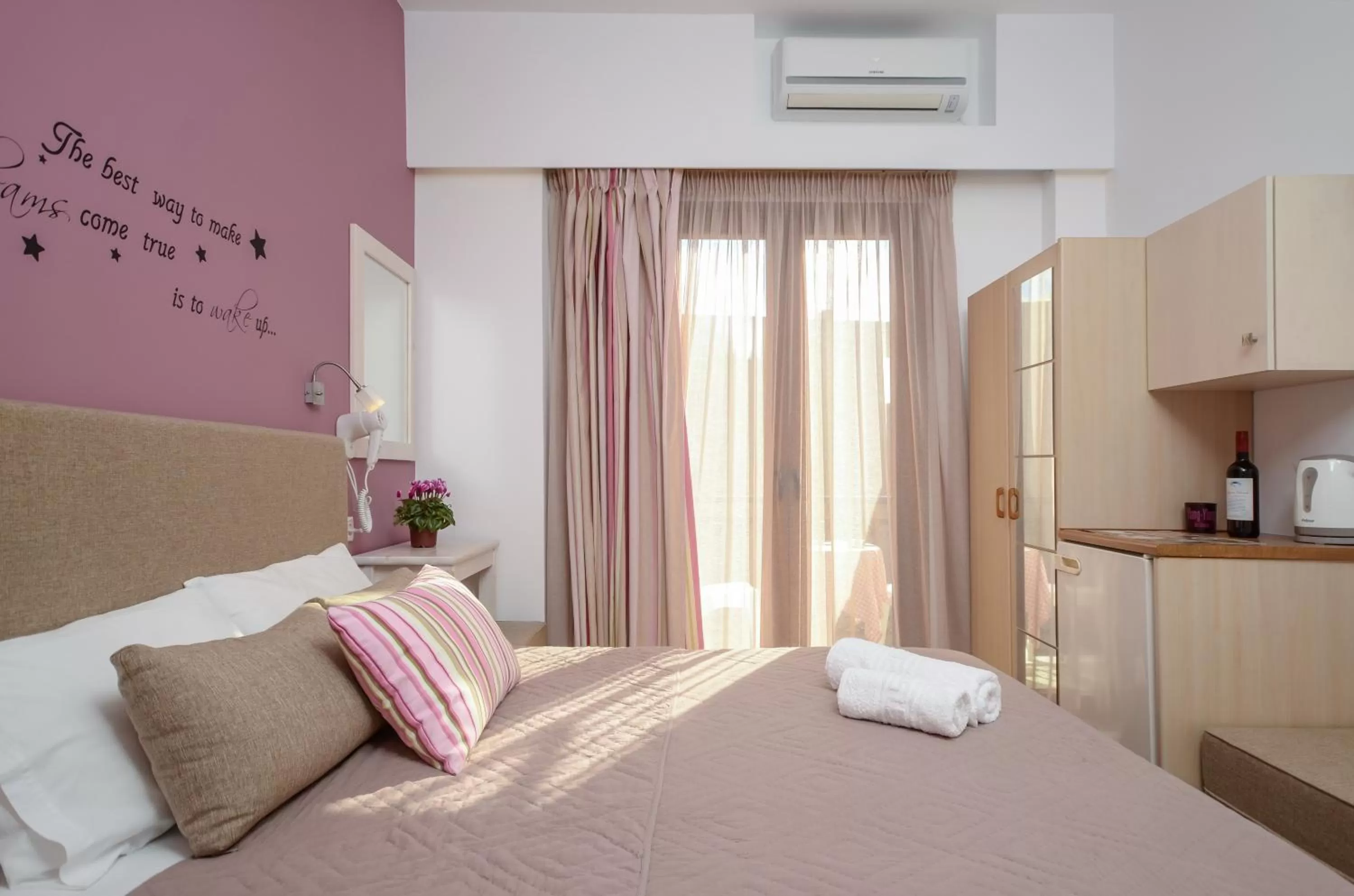 Bed in Panormos Hotel and Studios