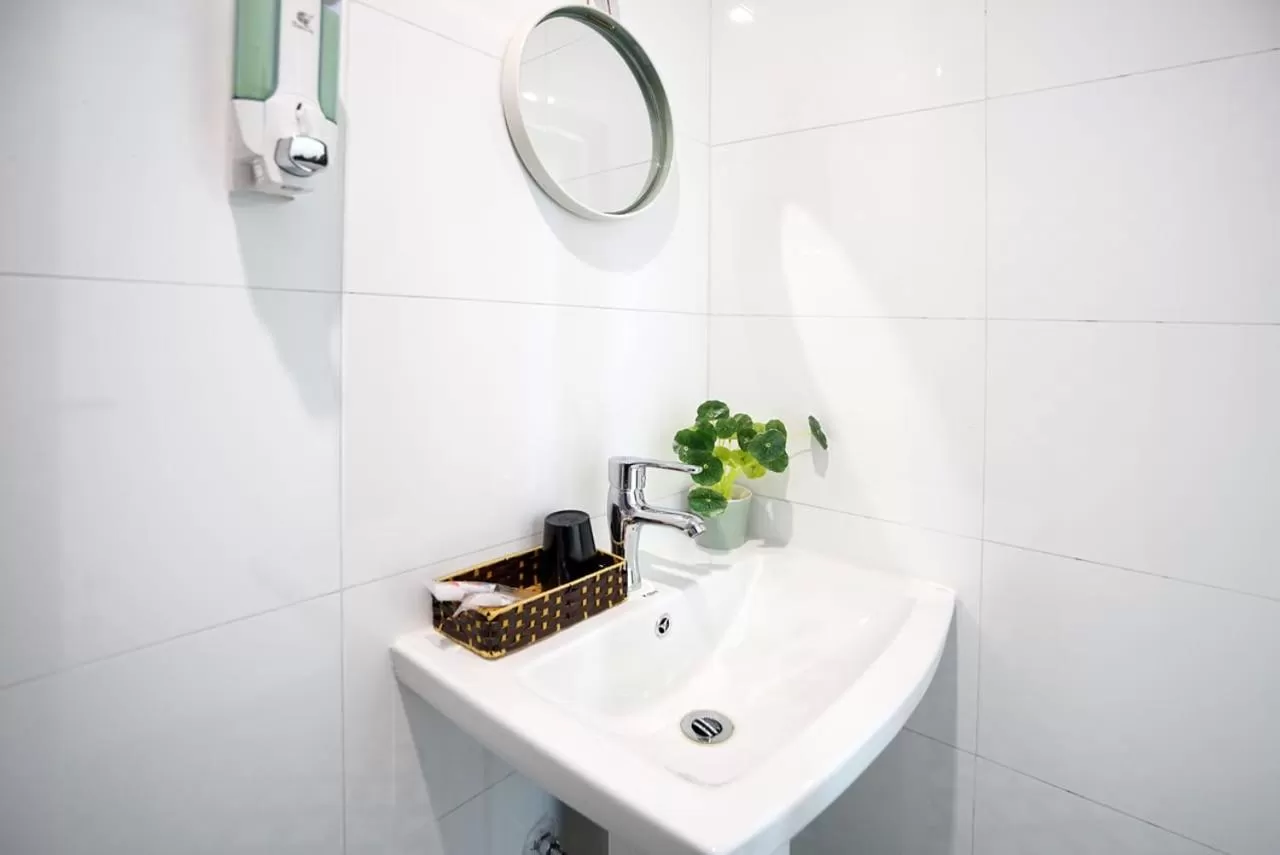 Bathroom in Almor Hostel With Pool in right center