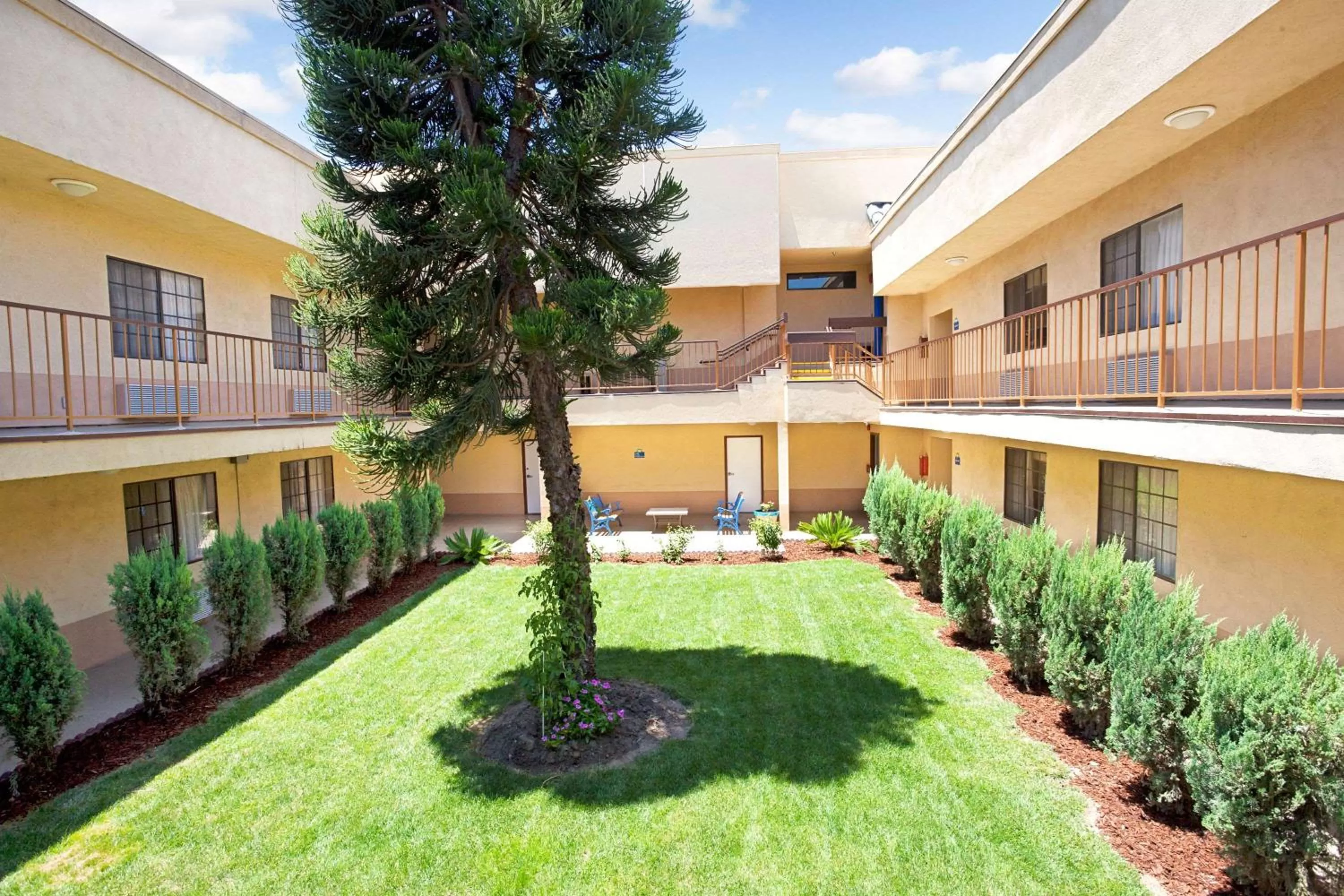Property building in Days Inn & Suites by Wyndham Artesia