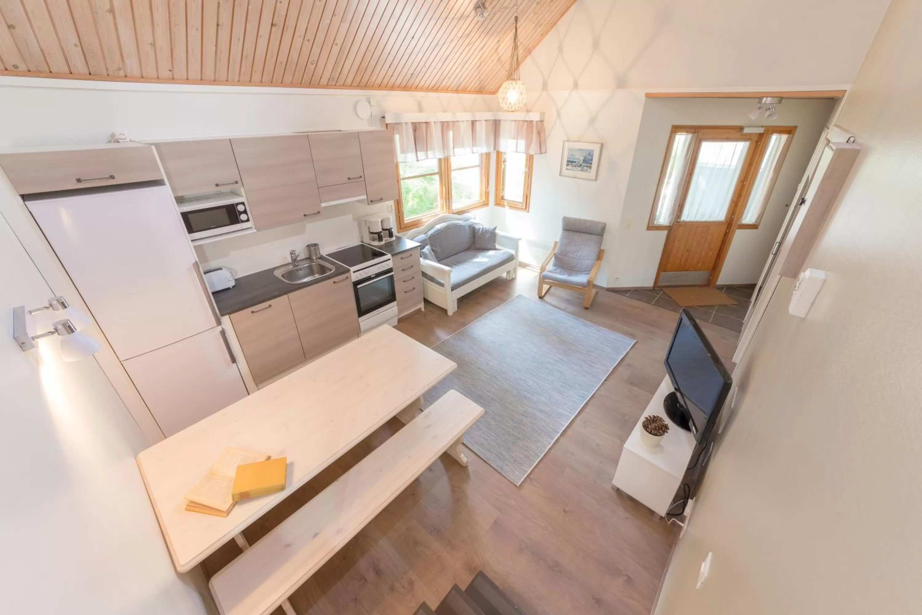 Kitchen or kitchenette in Yyteri Holiday Cottages