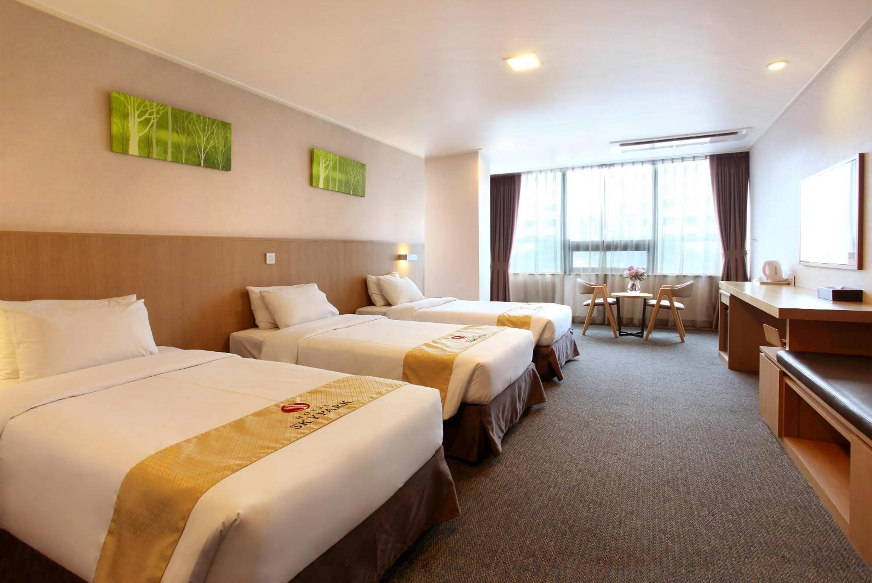 Bedroom, Bed in Hotel Skypark Jeju 1 Newly renovated