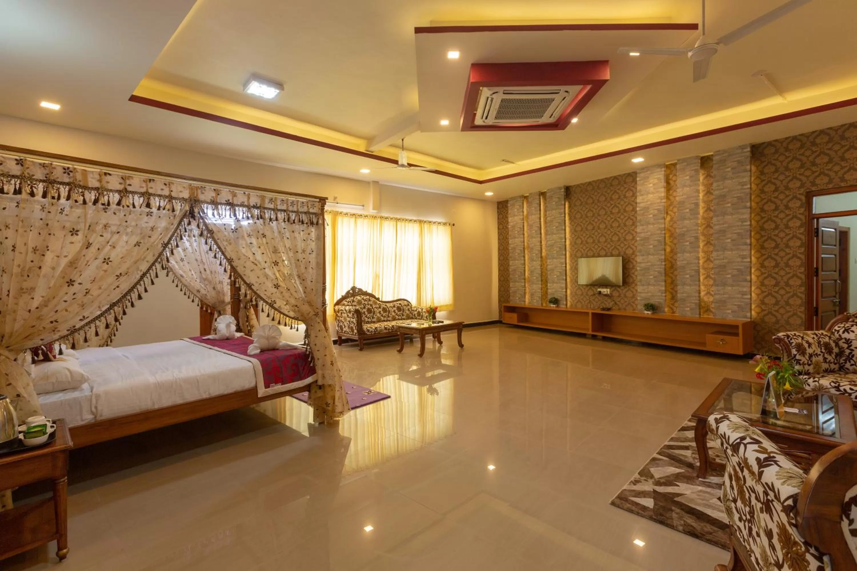 Bed in KSTDC Hotel Mayura Krishna Almatti