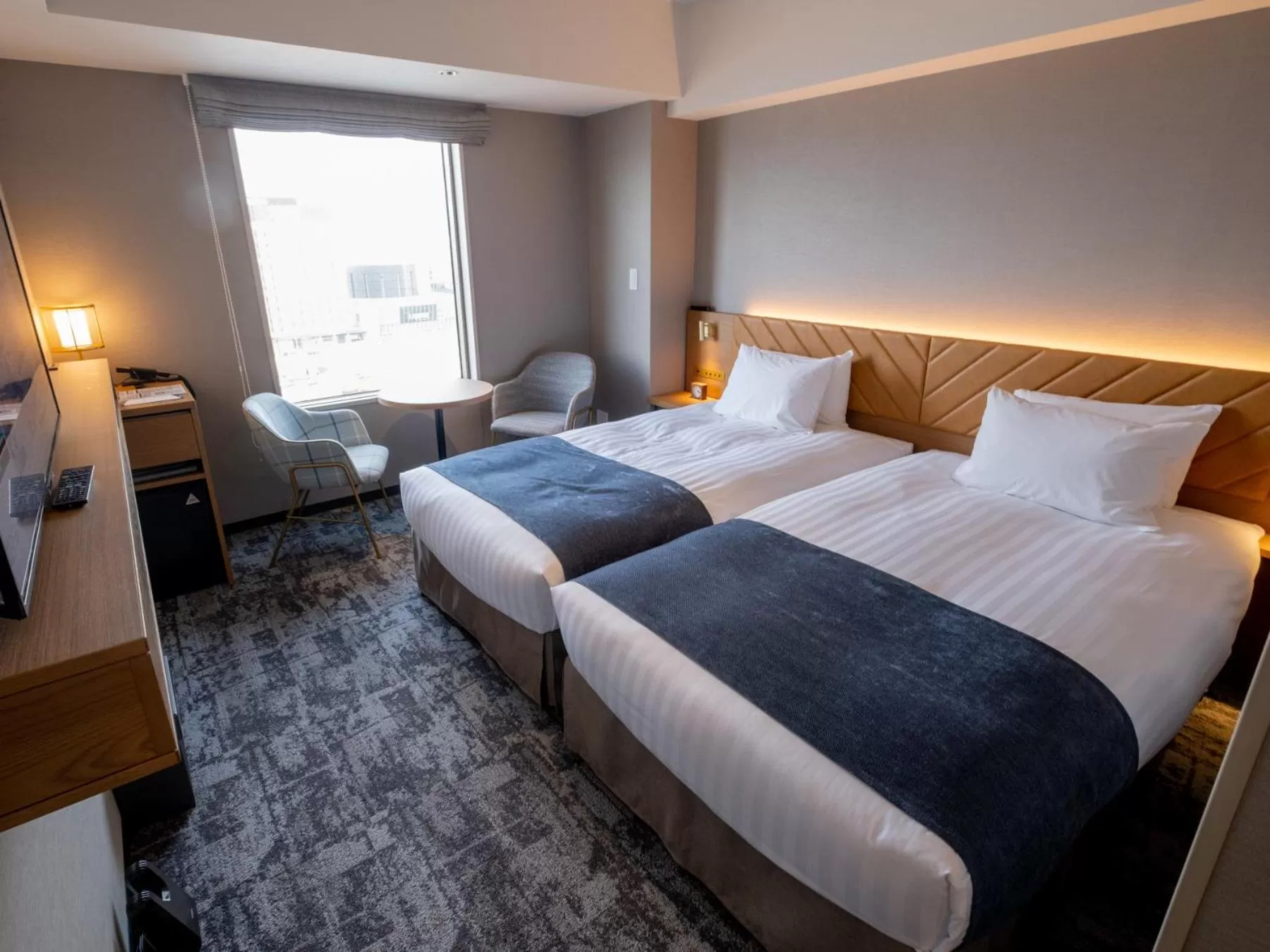 Bed in Tokyu Stay Hakodate Asaichi Akarinoyu