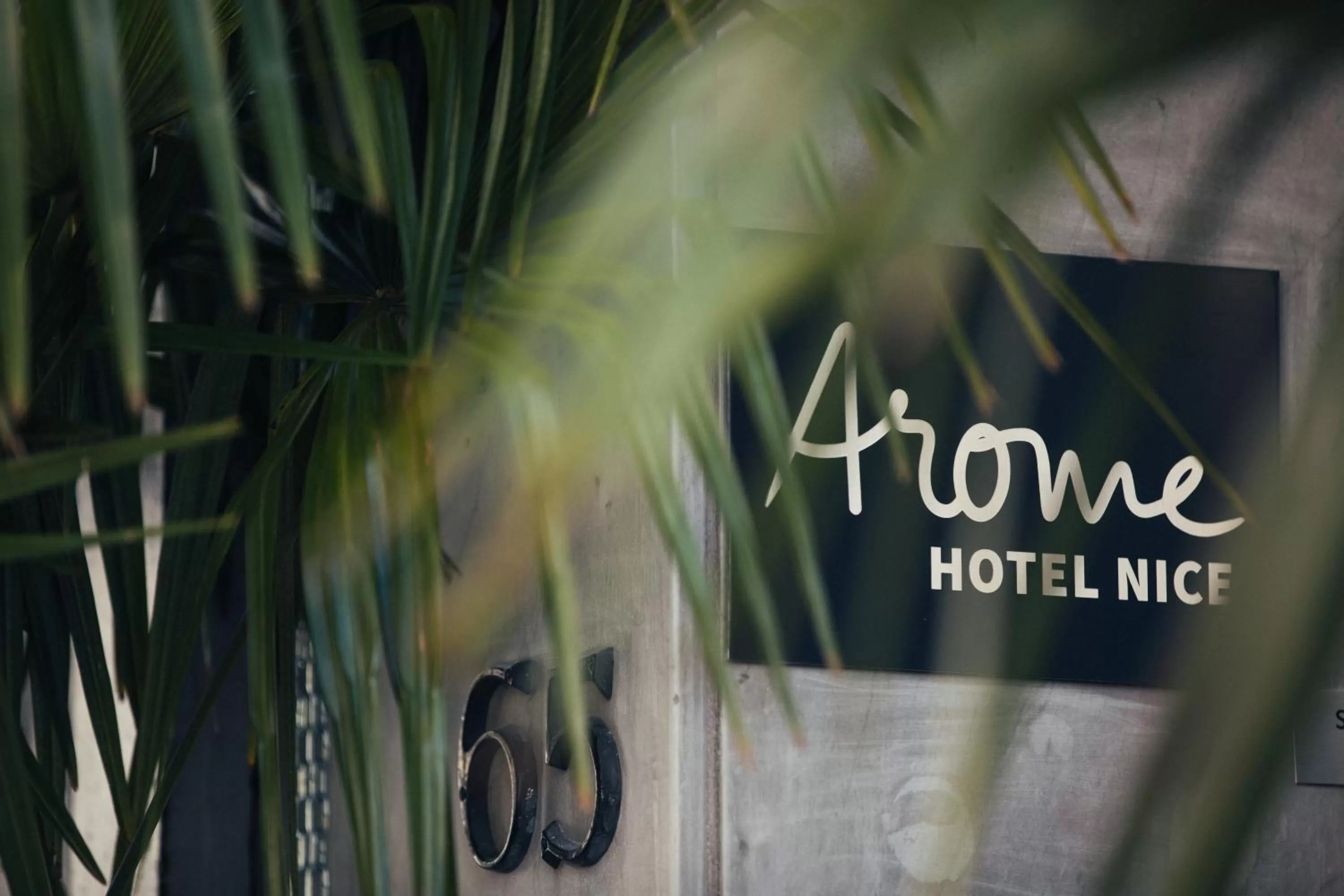 Facade/entrance in Arome Hôtel