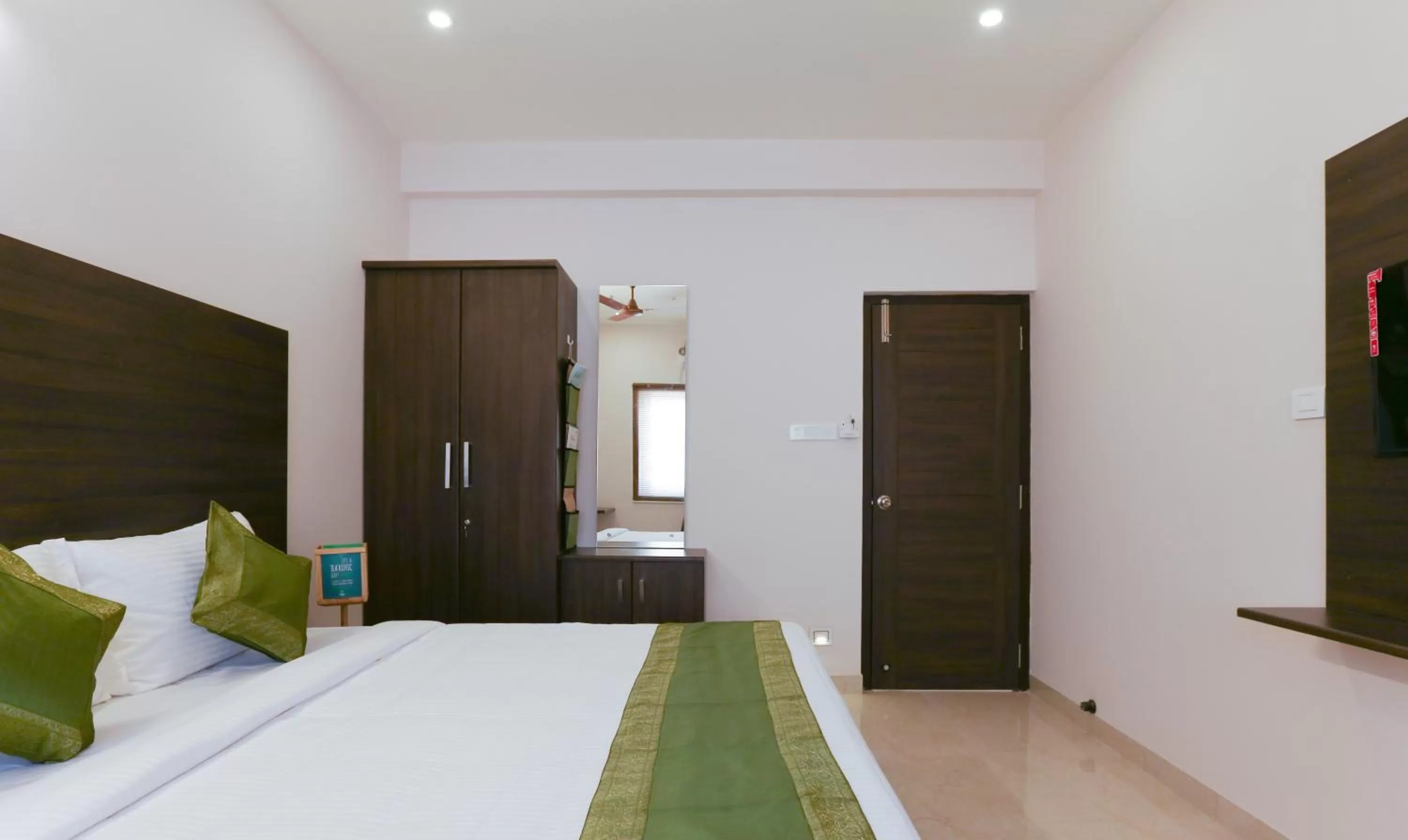 Bedroom, Bed in Treebo Hi Line Apartments Kalapatti