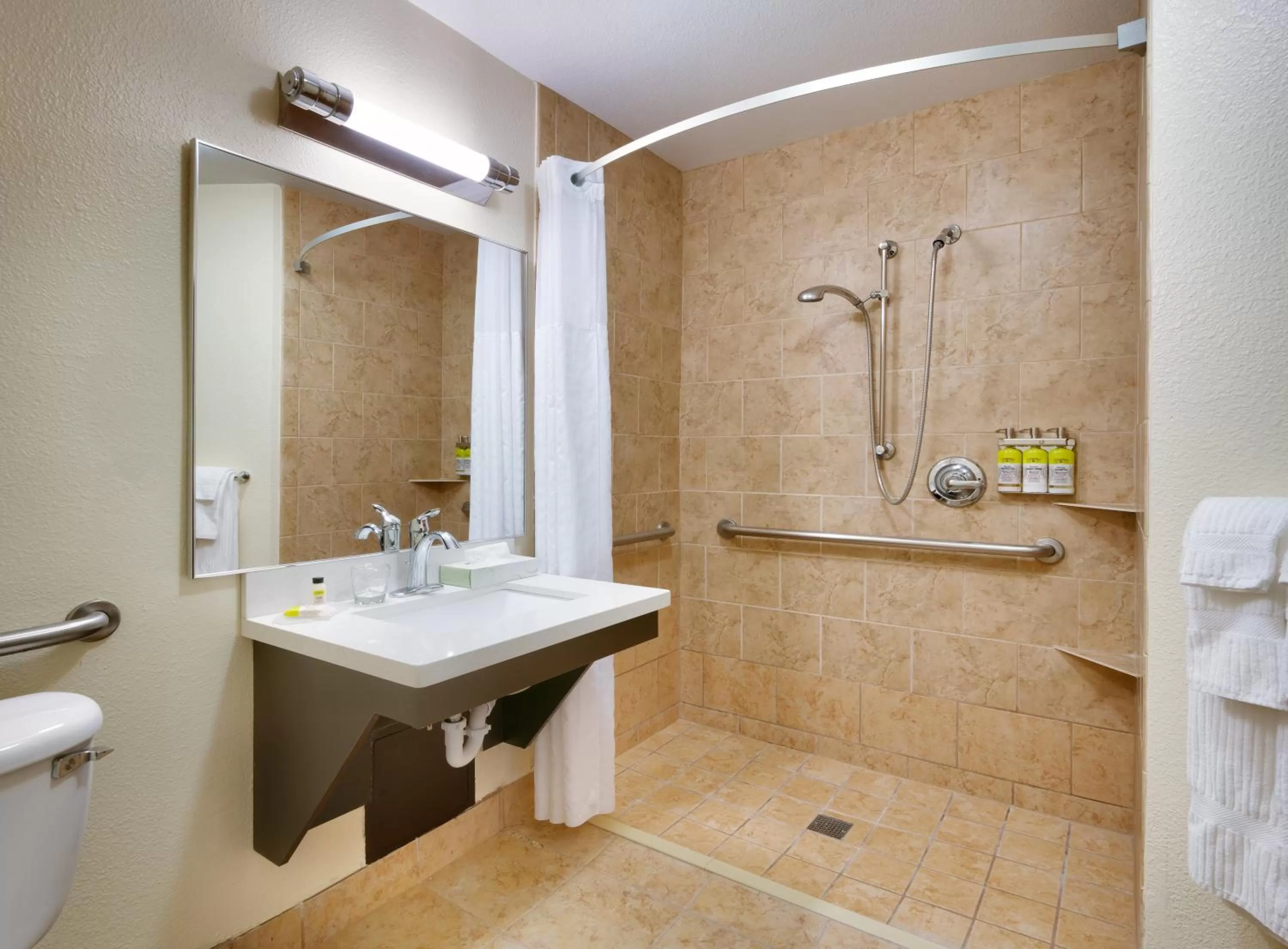 Bathroom in Candlewood Suites Plano East by IHG