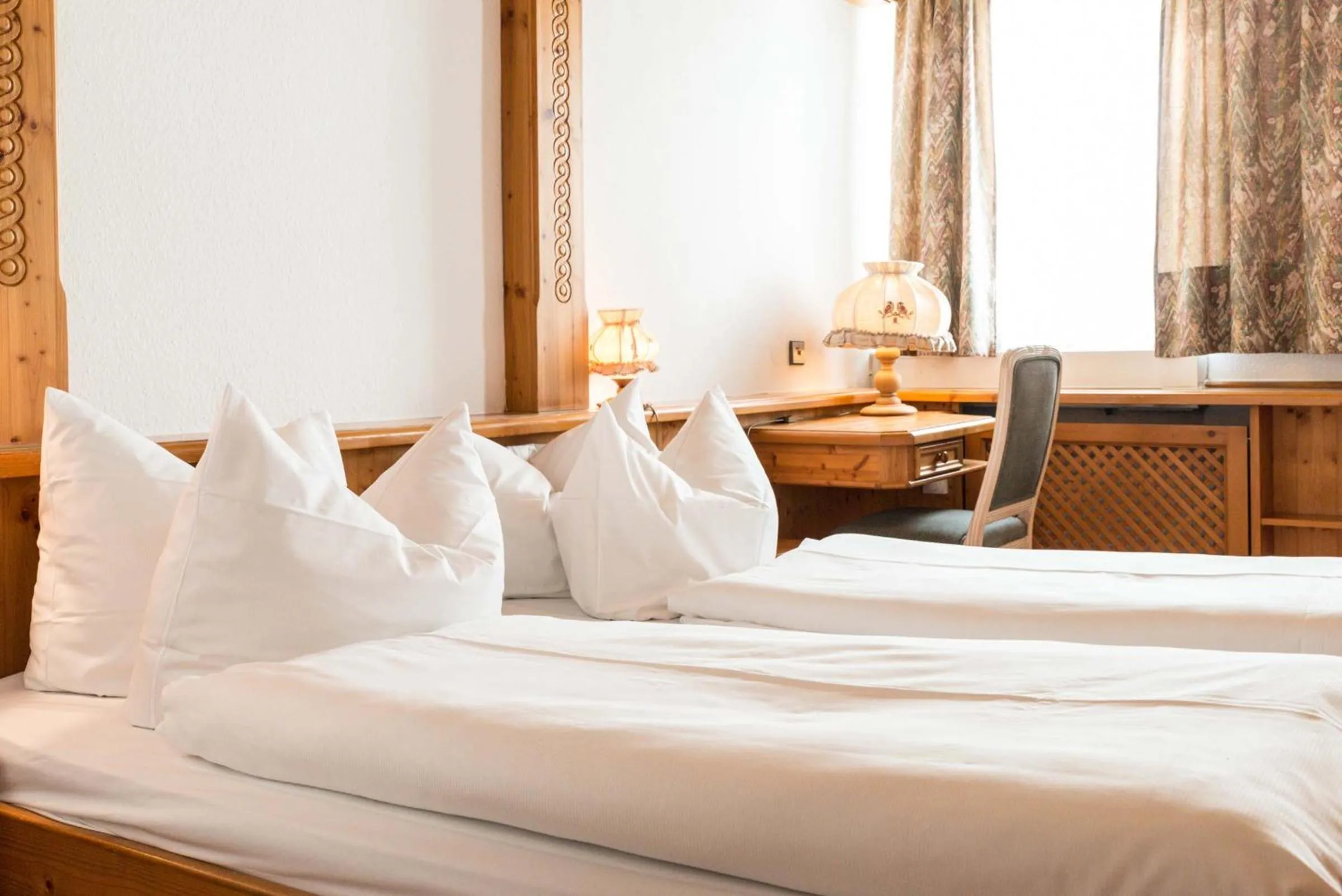 Photo of the whole room, Bed in Flair Hotel Vier Jahreszeiten