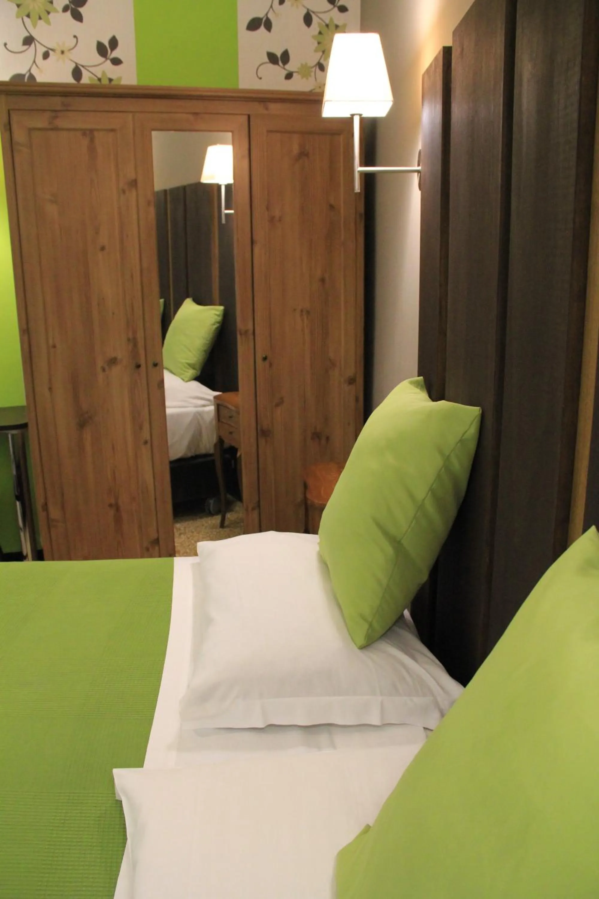 Decorative detail, Bed in Hotel Bologna