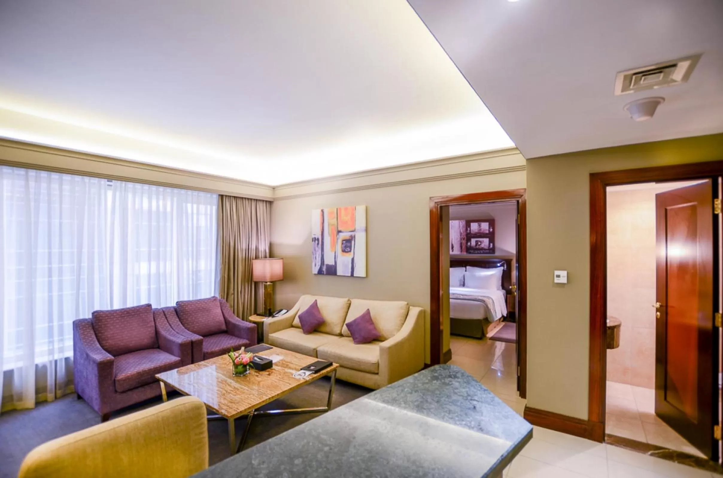 Living room, Bed in Somewhere Hotel Apartment