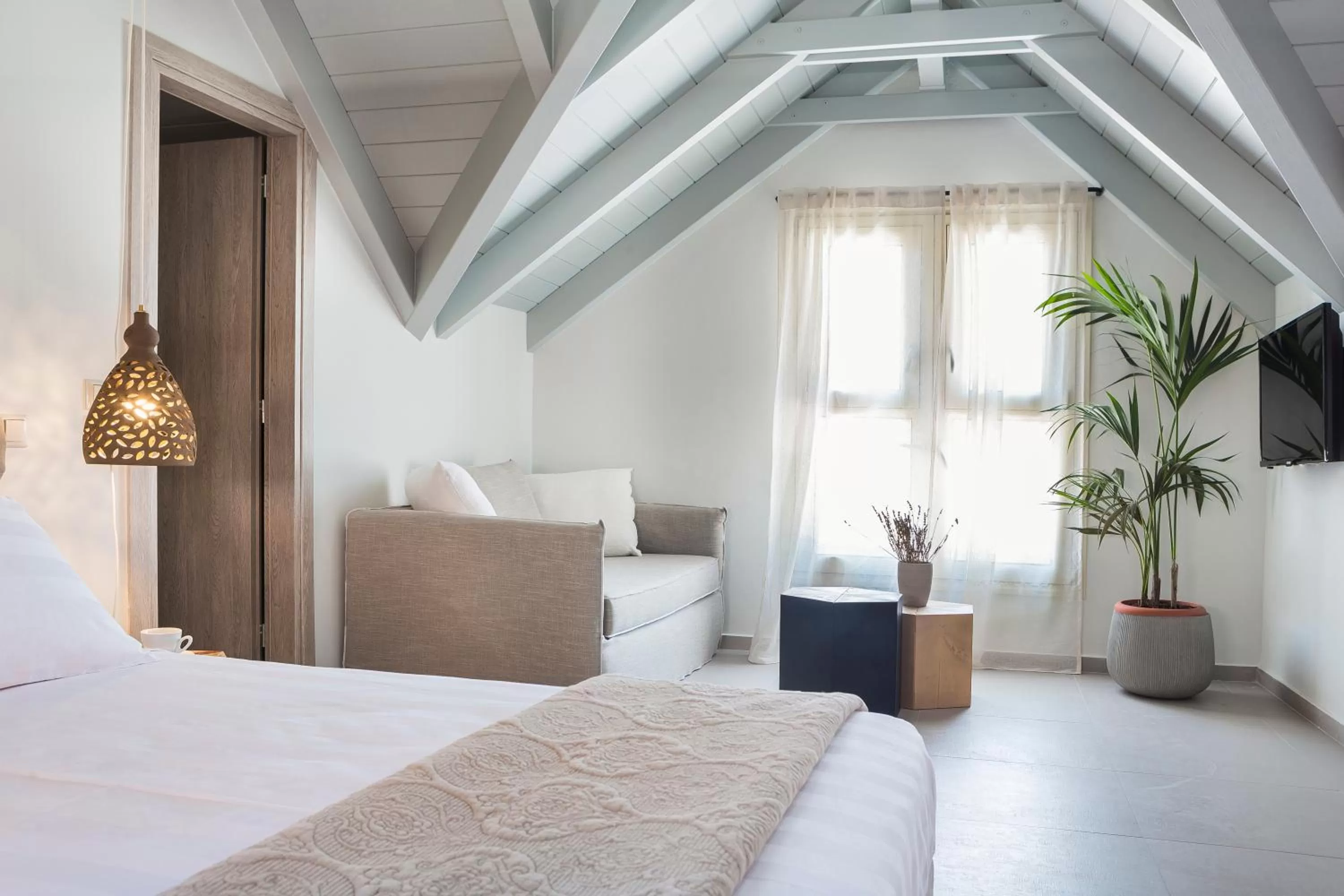 Seating area, Bed in Argostoli Marina Suites