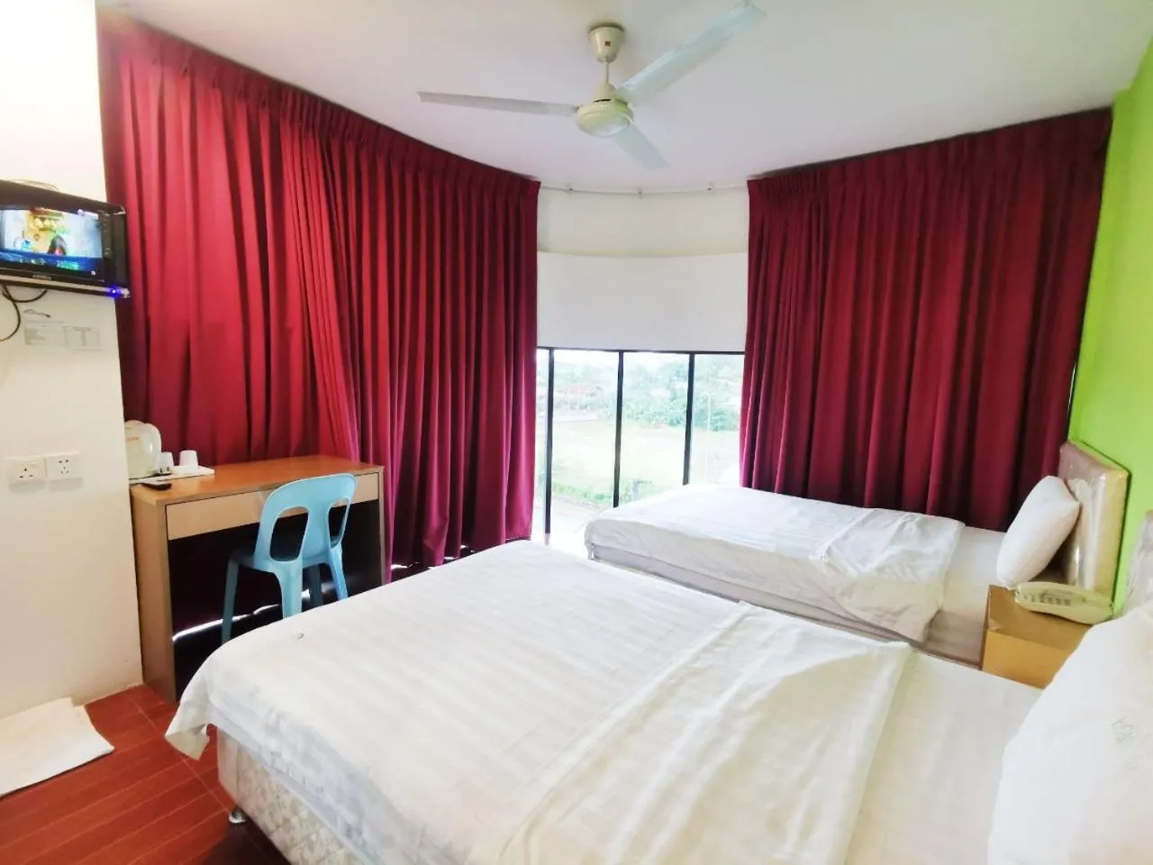 Bed in Homestay Kuching Hotel