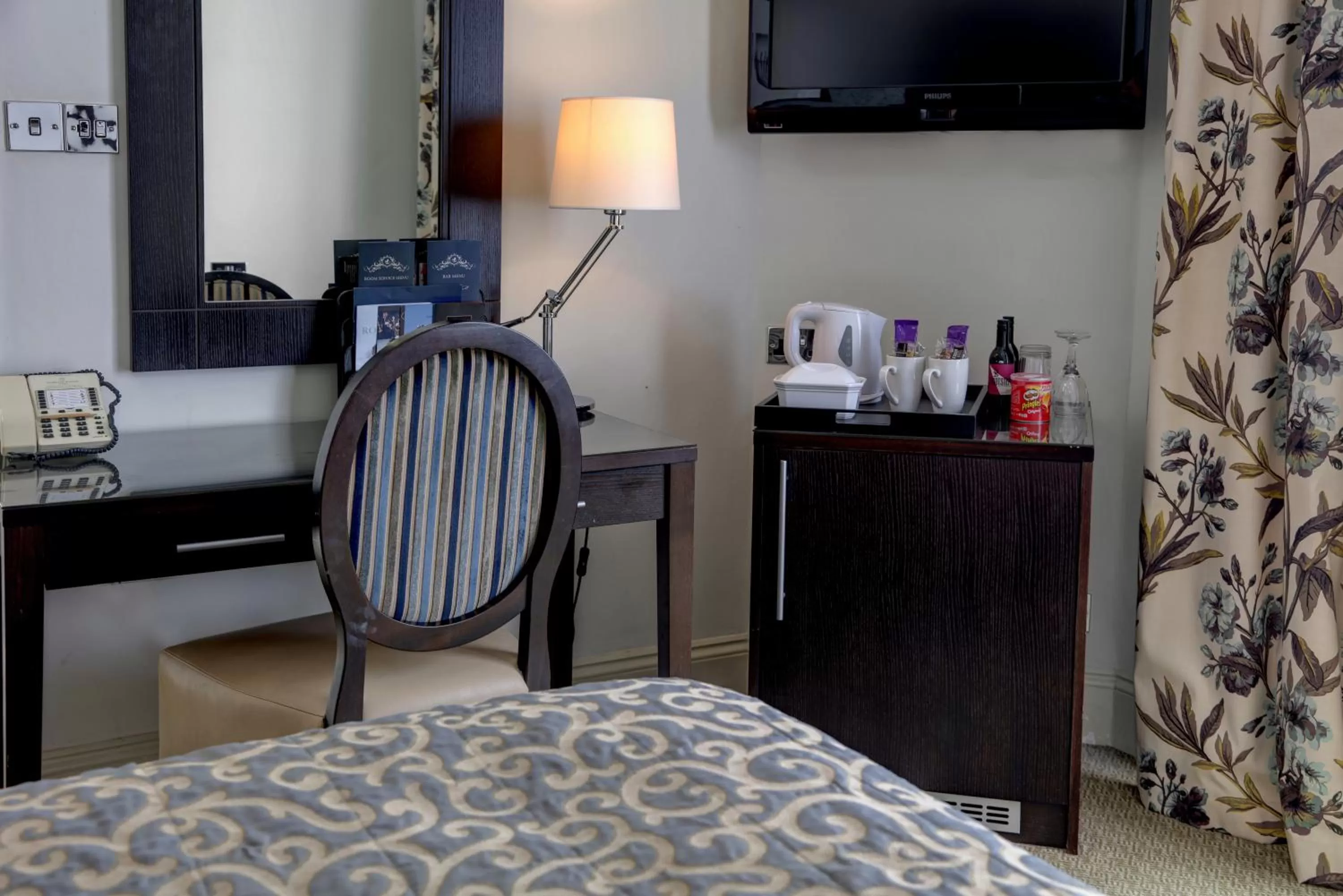 Decorative detail, Bed in Norfolk Royale Hotel