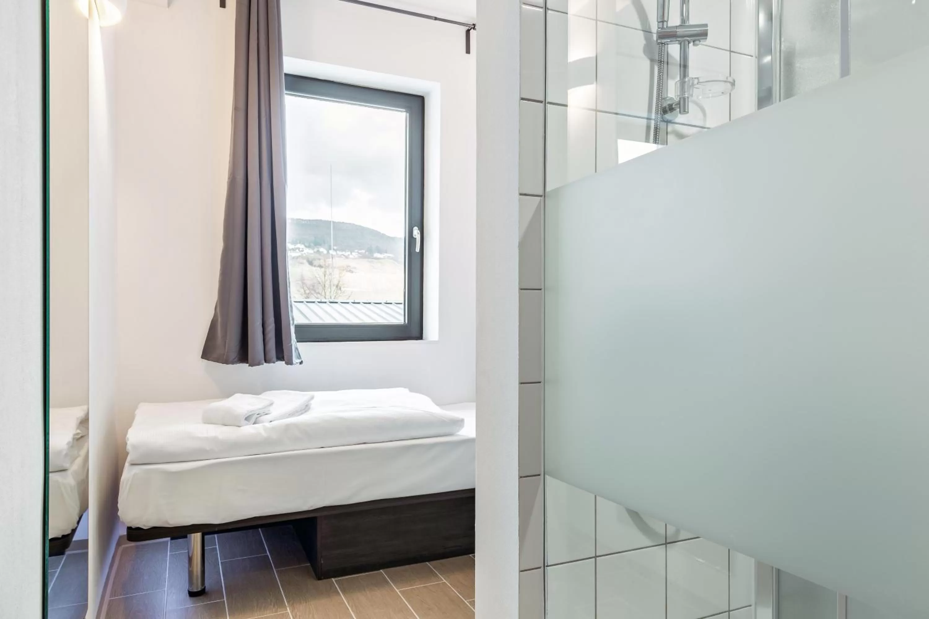 Photo of the whole room, Bed in Augustus Hotel Bernkastel - Comfortable Budget Hotel